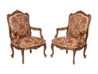 A Pair of Rococo Style Carved Walnut Armchairs