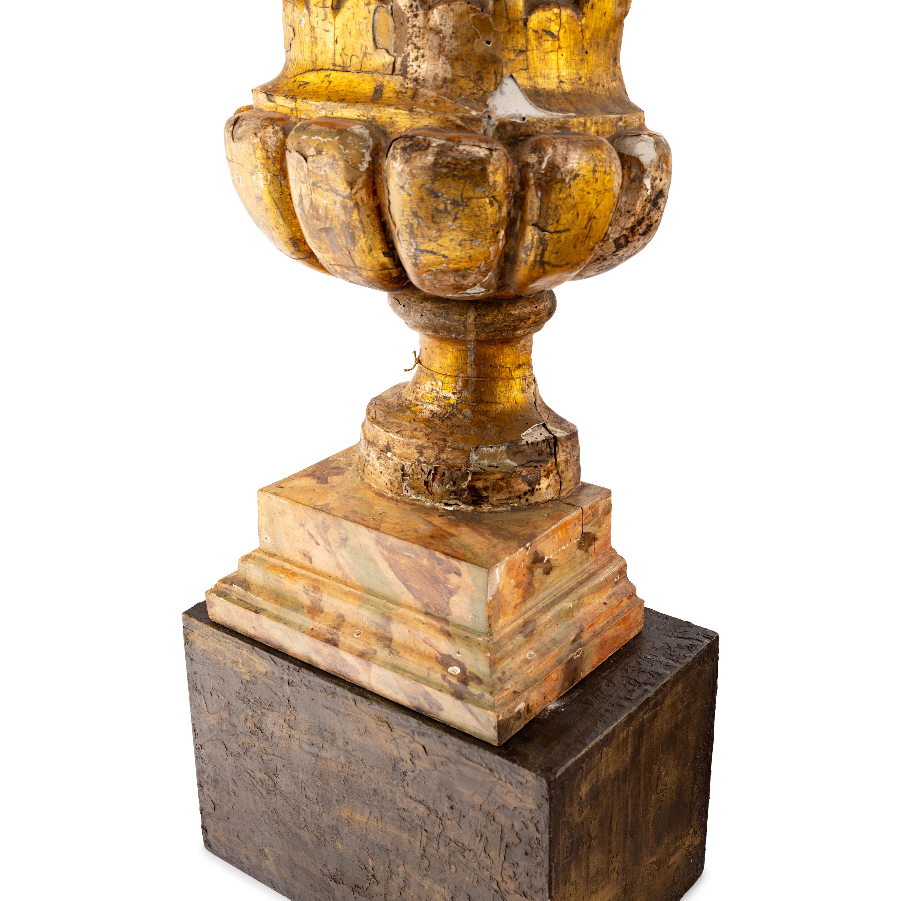 A Pair of Italian Giltwood Flat-Back Urns