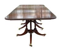 A Regency Style Walnut Dining Table