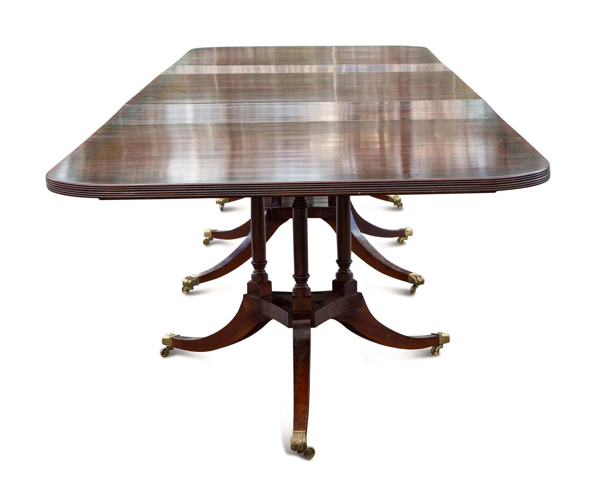 A Regency Style Walnut Dining Table