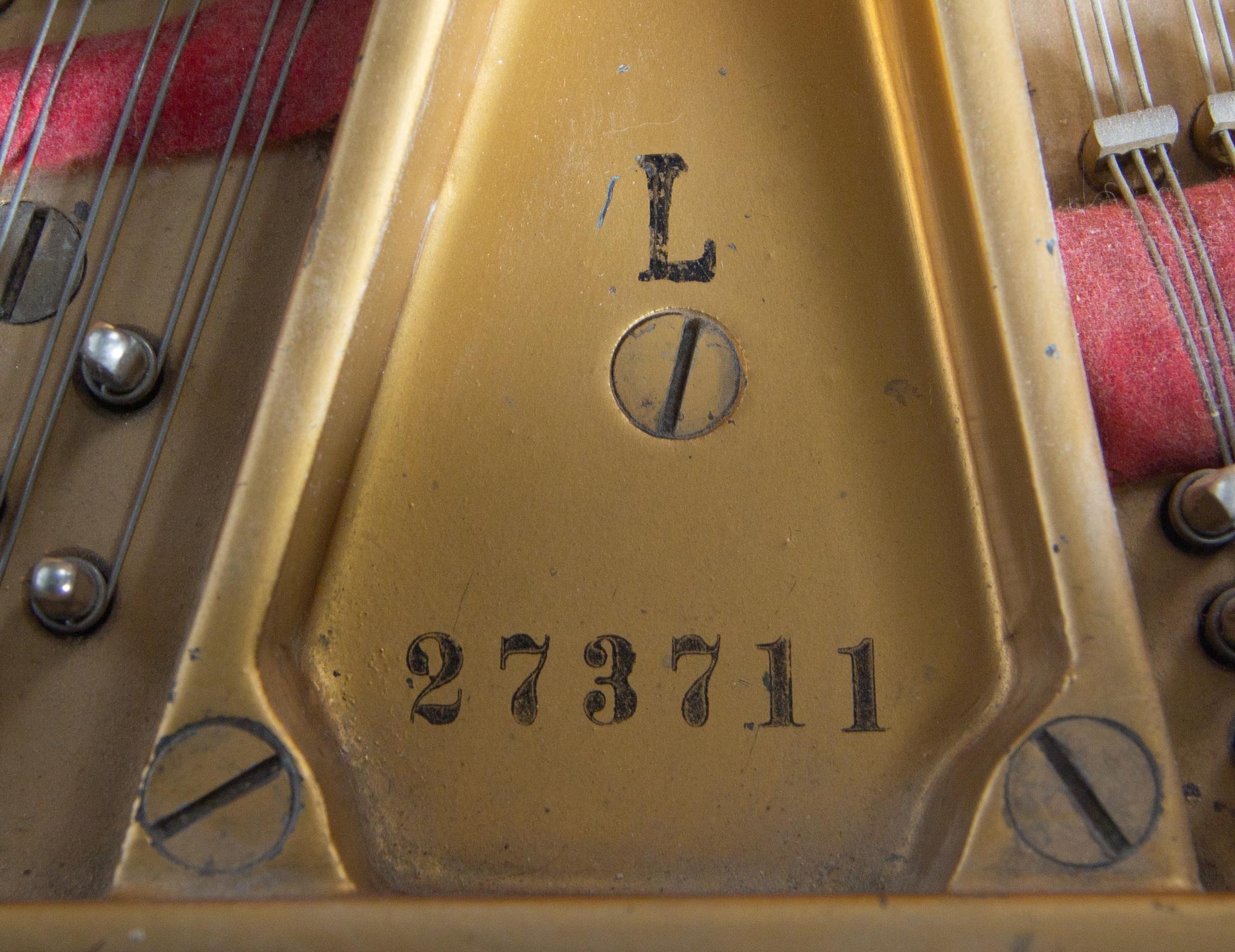 A Steinway and Sons Model L Grand Piano
