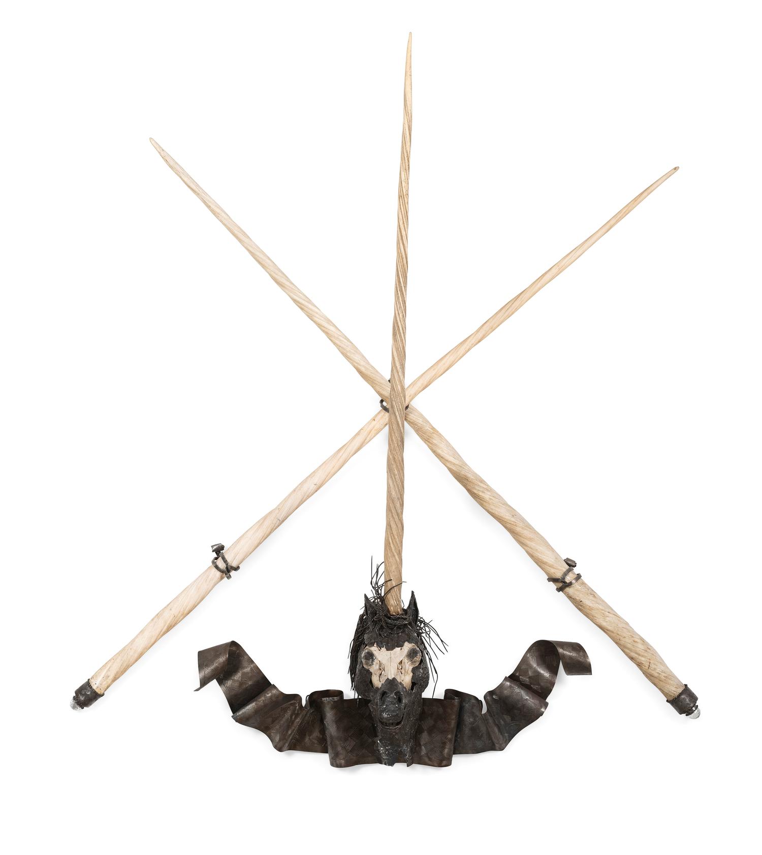 A Cast Metal, Bone, and Narwhal Tusk Installation