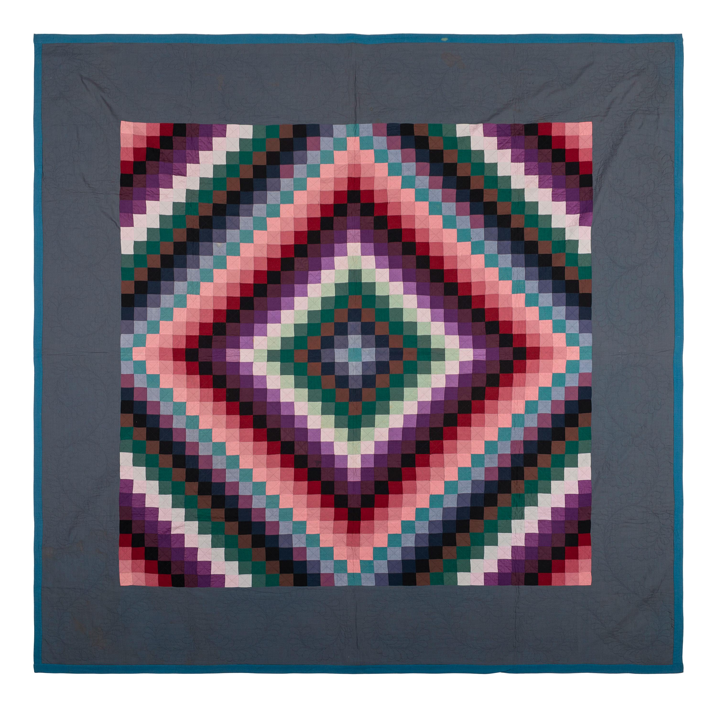 An Amish Sunshine and Shadow Pieced Cotton Quilt