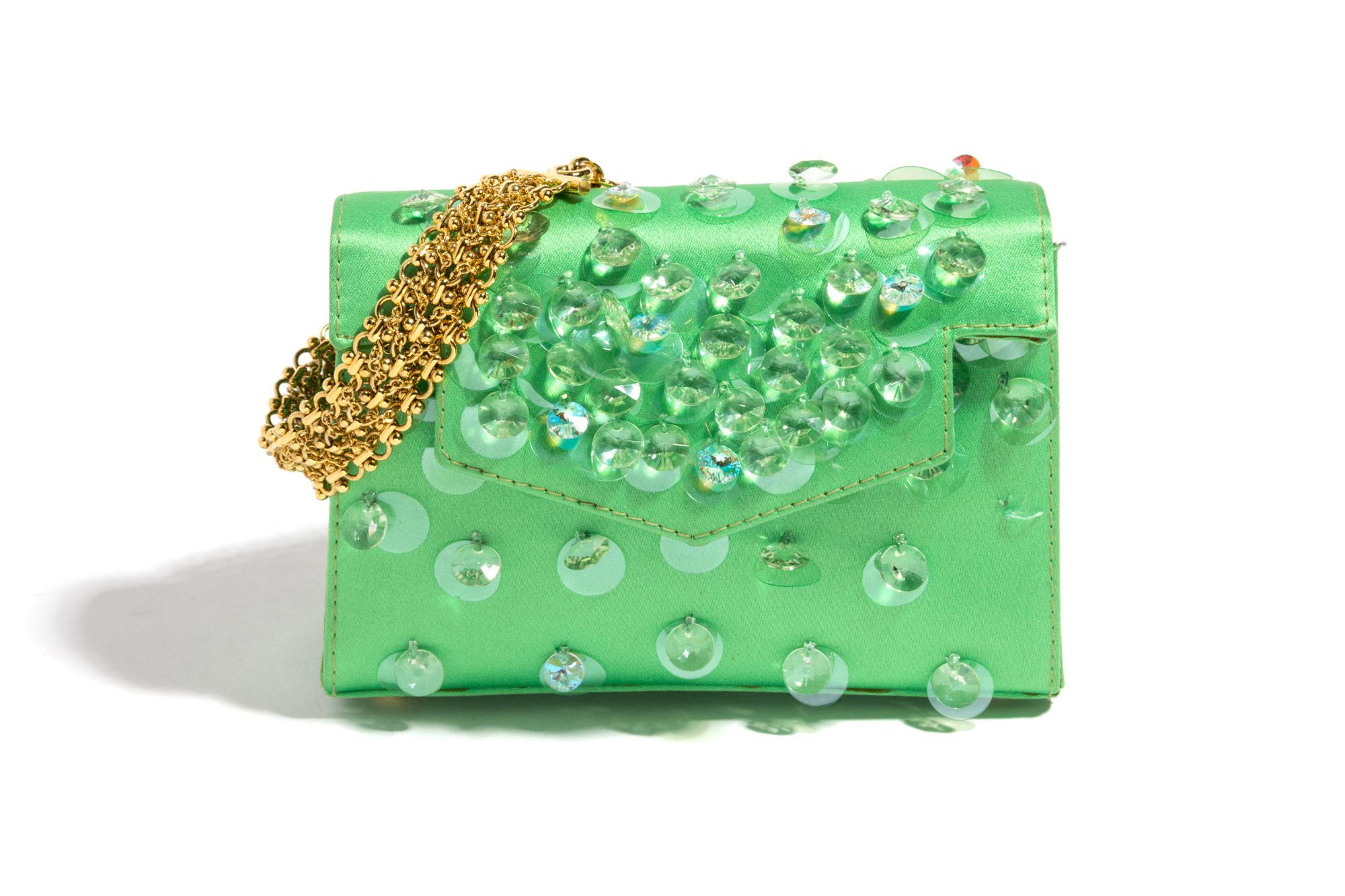A Gianni Versace Green Silk Wristlet, 5.75" x 4" x 2"; Bracelet: 10" x .75".