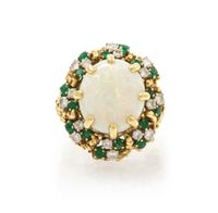 An 18 Karat Yellow Gold, Opal, Emerald and Diamond Ring, 17.70 dwts.
