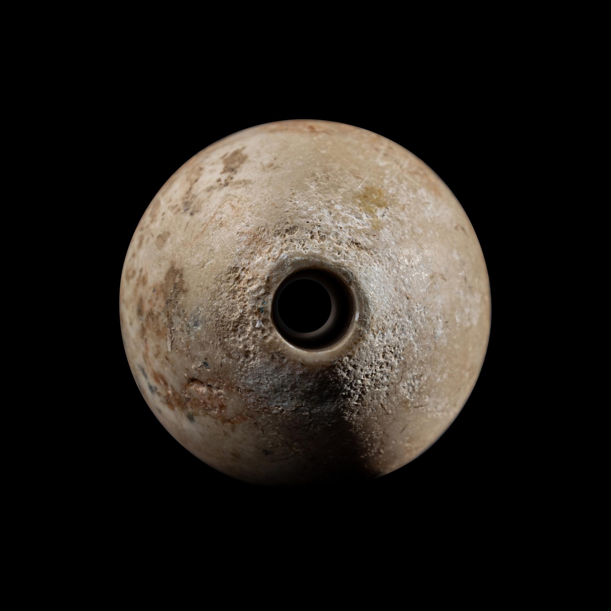 An Egyptian Limestone Mace Head