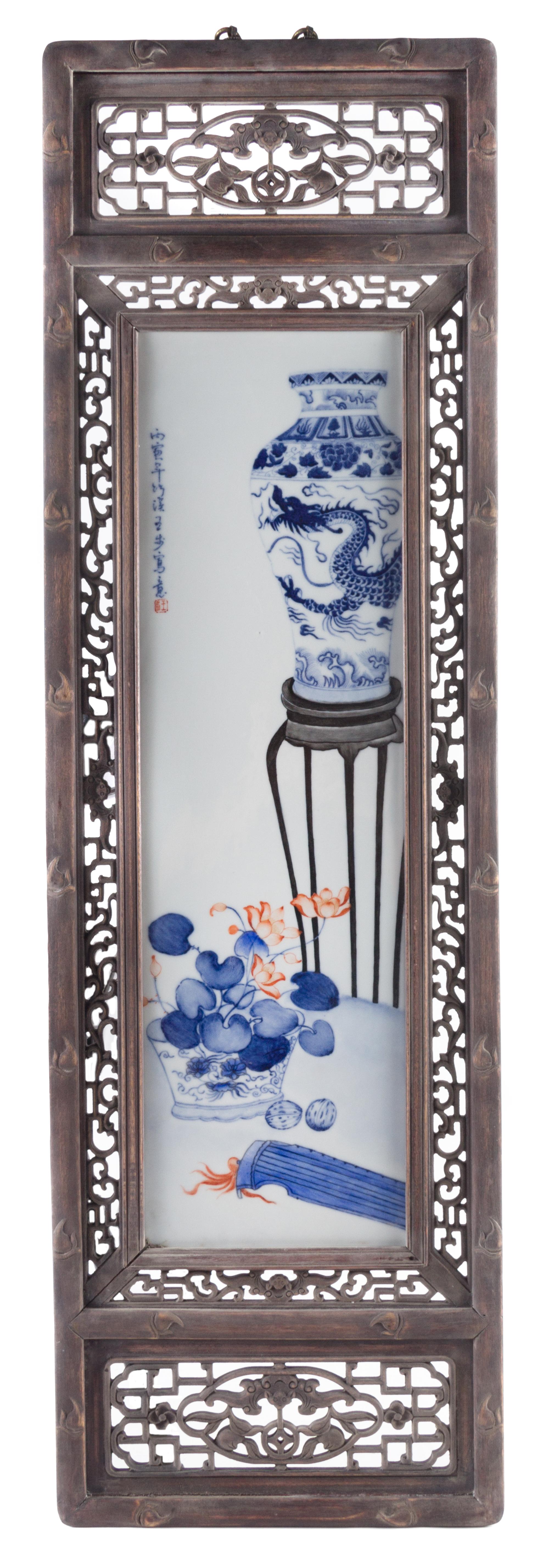 A Set of Four Blue and White Porcelain Plaques Height of each panel 28 3/4 x width 8 1/4 inches.