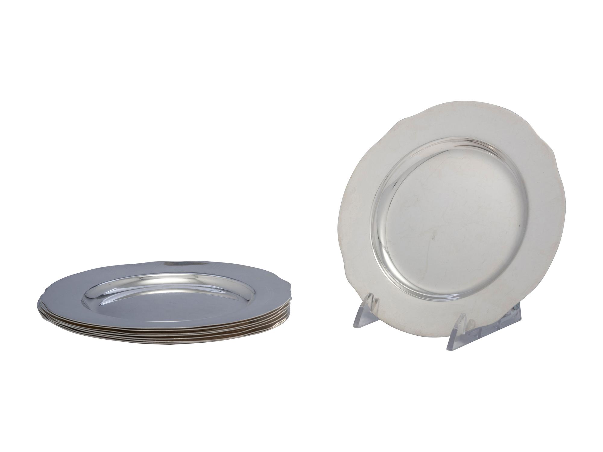 Eight American Silver Bread Plates