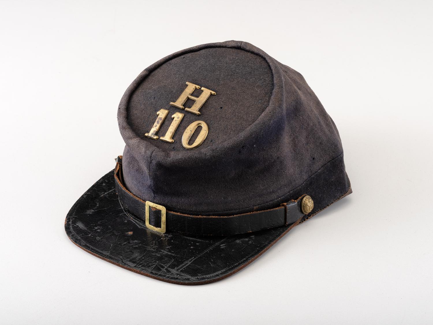 [CIVIL WAR]. A collection of items identified to brothers Robert and Samuel Burnside, Company H, 110th New York Infantry, comprised of a kepi and war-date photographs.