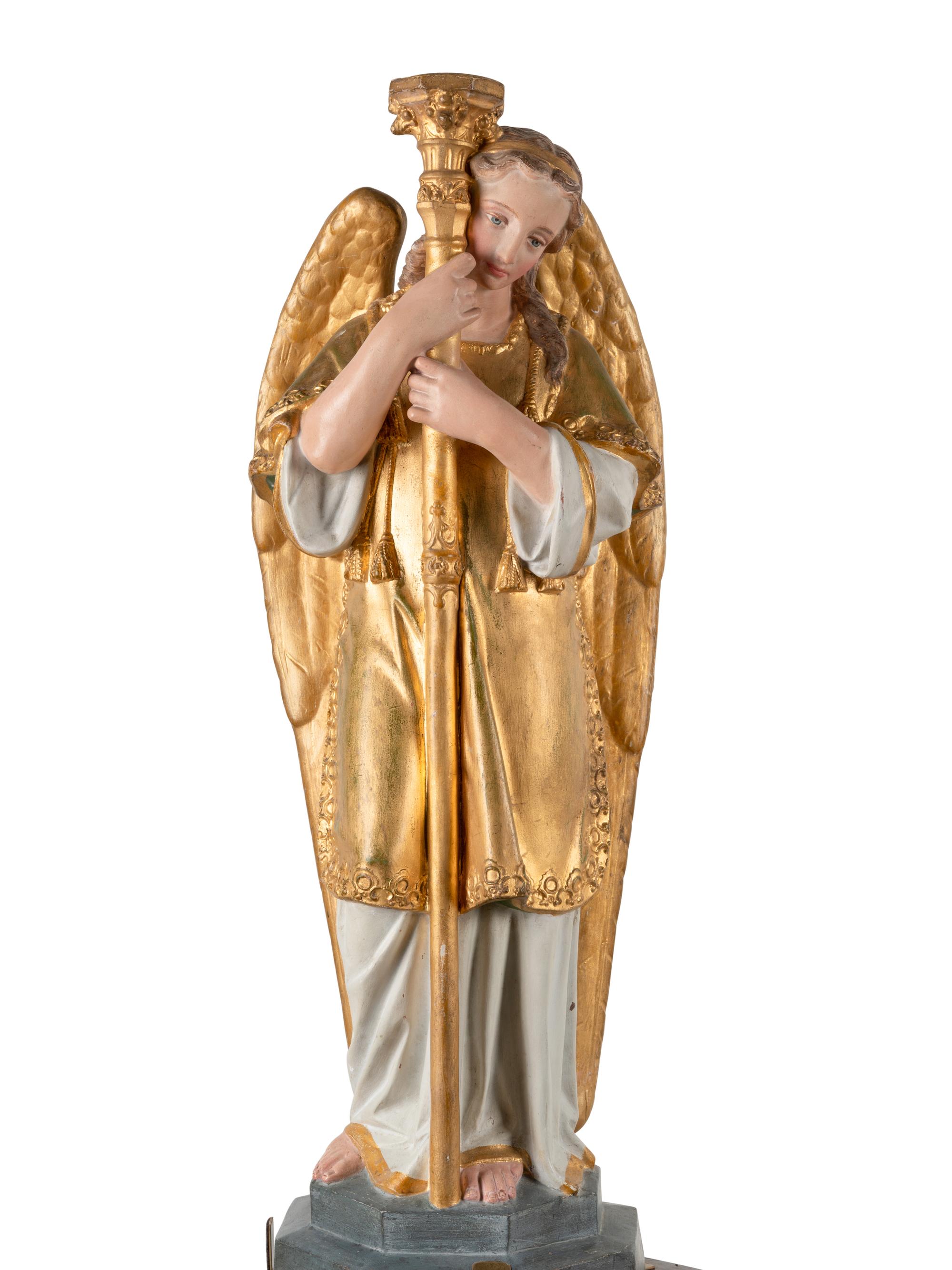 A Pair of Painted and Parcel Gilt Figural Altar Prickets with Associated Gothic Revival Pedestals