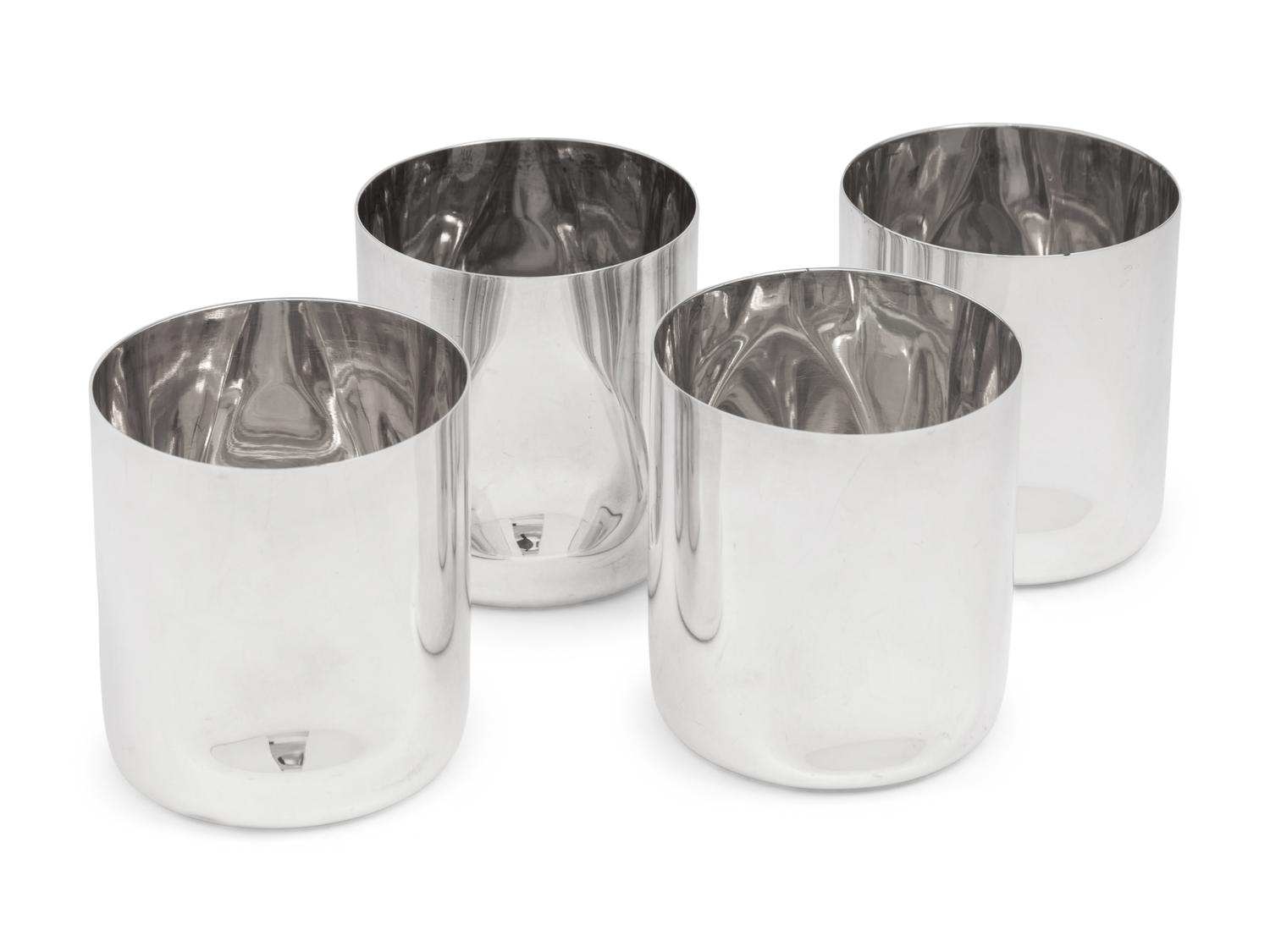 A Set of Four Elsa Peretti for Tiffany and Co. Italian Silver Thumbprint Tumblers