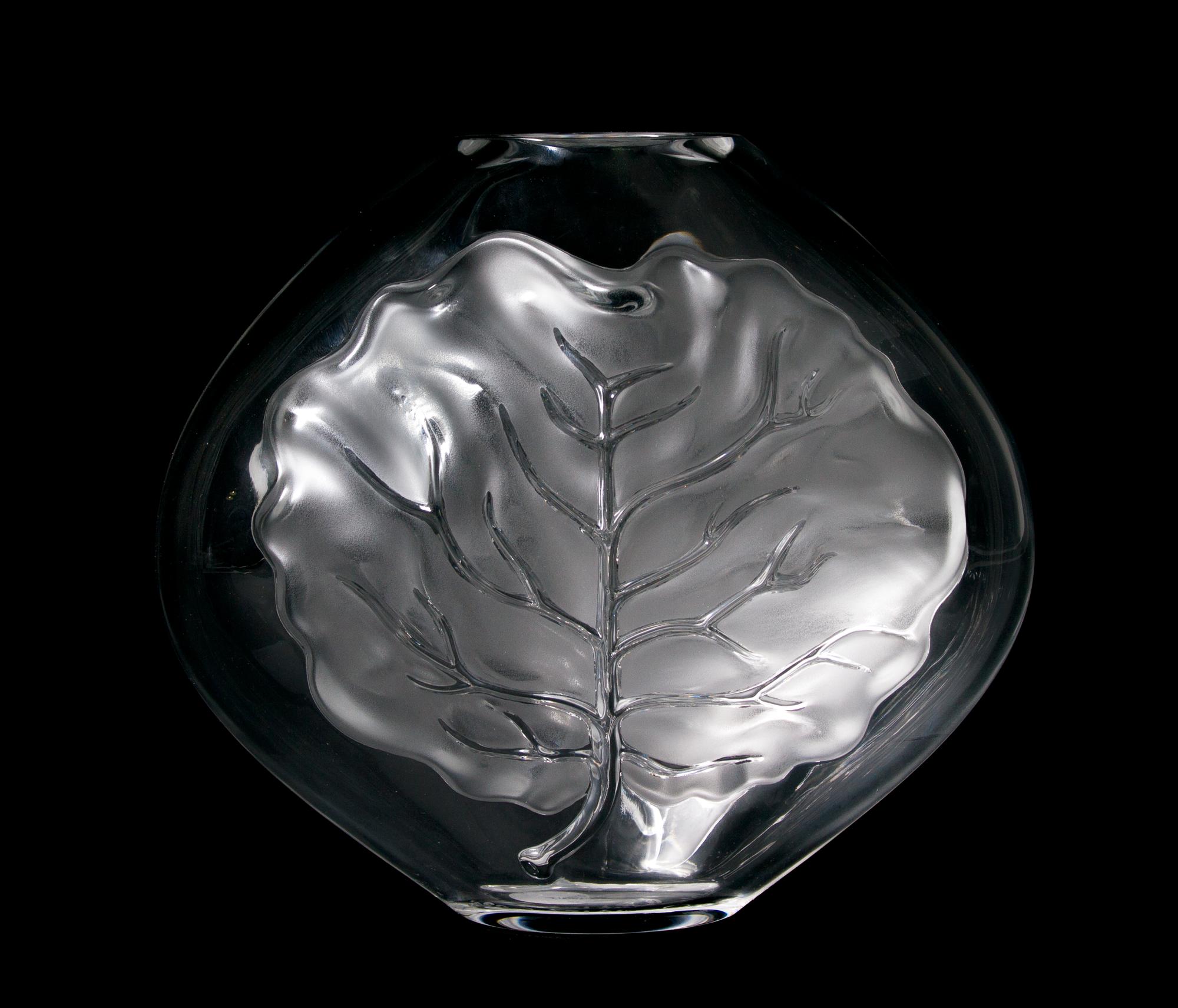 A Lalique Molded and Frosted Glass Vase, Height 8 5/8 inches.