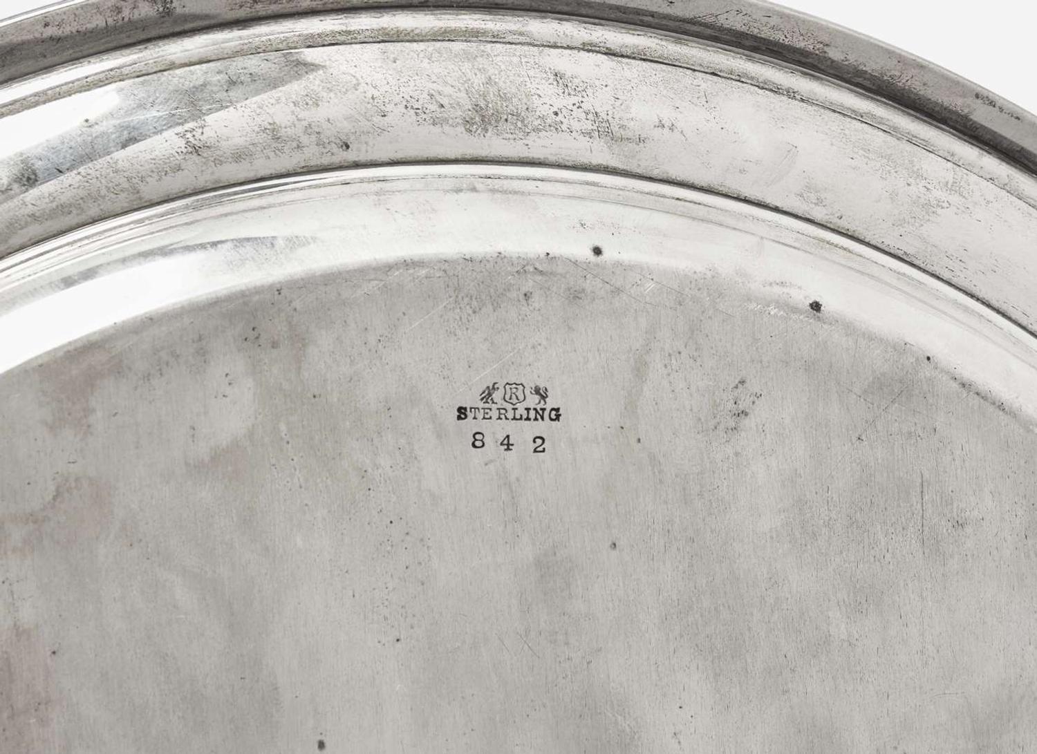 An assembled four-piece sterling silver coffee service, Dominick & Haff, New York, NY and Reed & Barton, Taunton, MA, 20th century