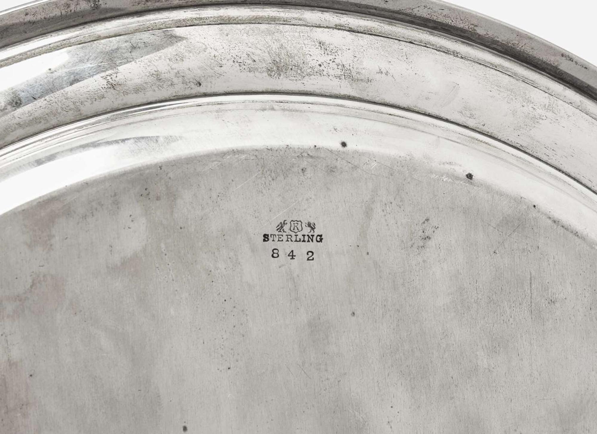 An assembled four-piece sterling silver coffee service, Dominick & Haff, New York, NY and Reed & Barton, Taunton, MA, 20th century