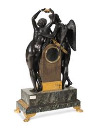 A French Parcel Gilt and Patinated Bronze Figural Mantel Clock