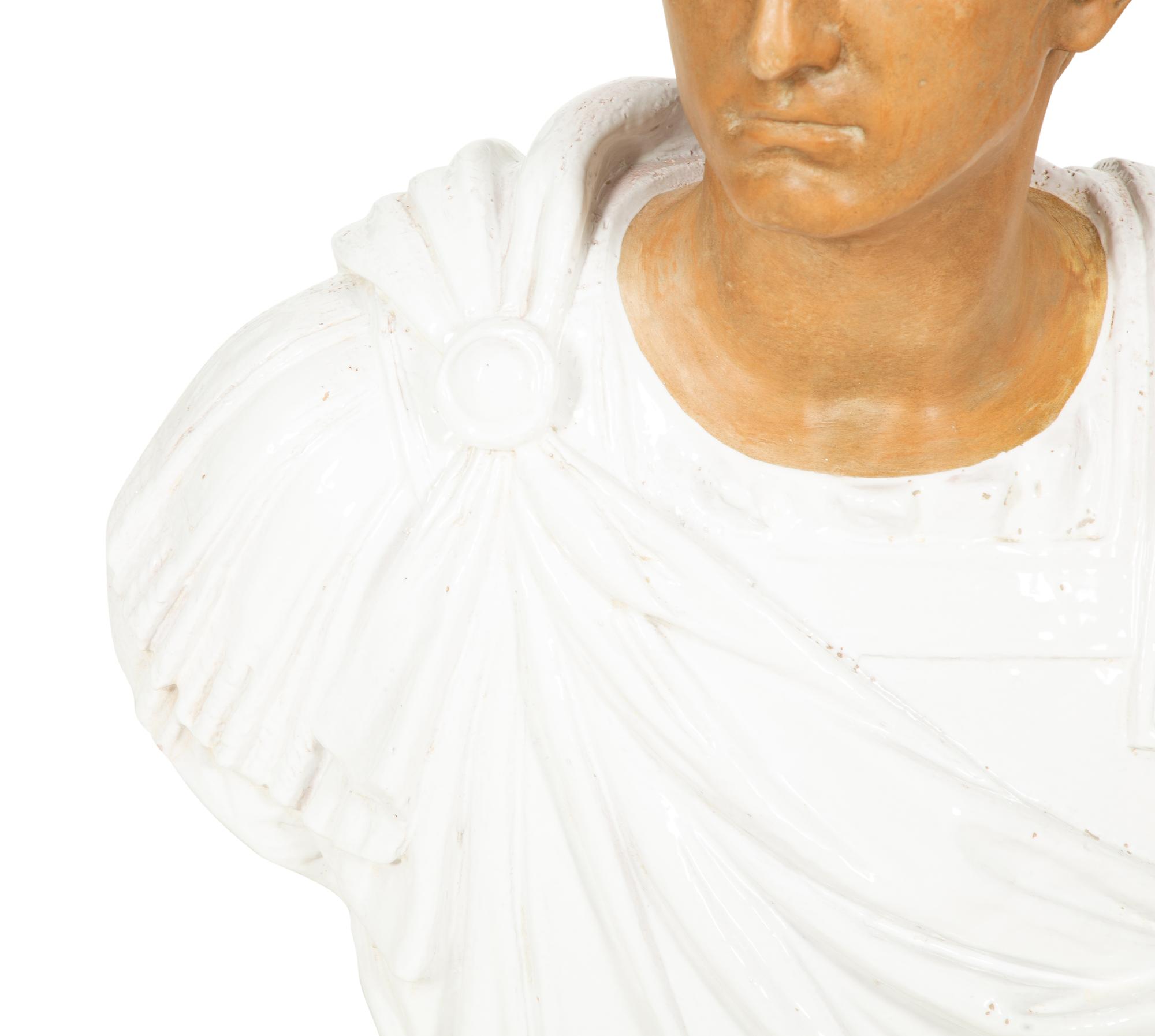 An Italian Glazed Terracotta Bust of a Roman Senator