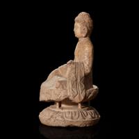 A Chinese carved white marble figure of Buddha seated