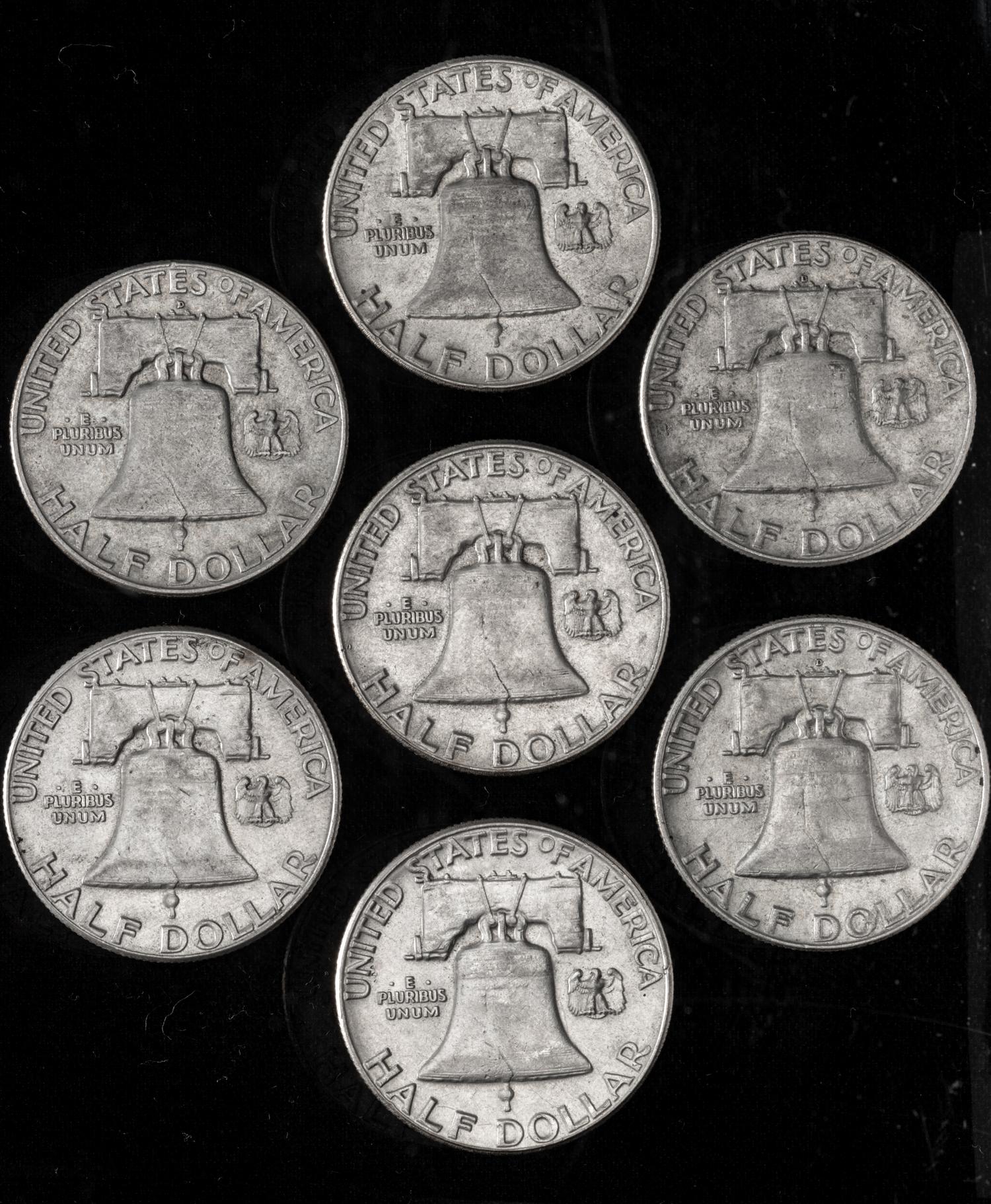 A Collection of Seven United States Benjamin Franklin 50C Coins