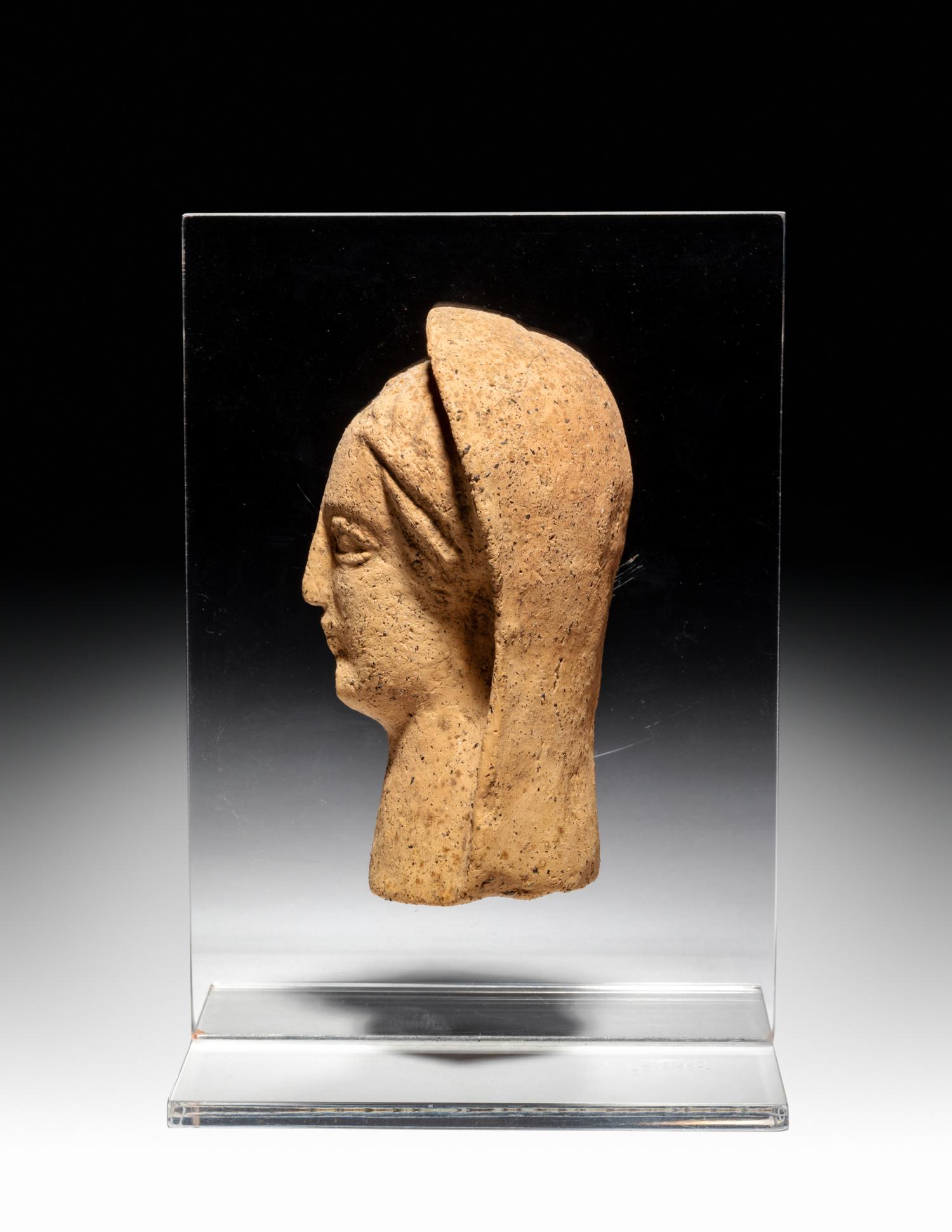 An Etruscan Terra Cotta Votive Half Head