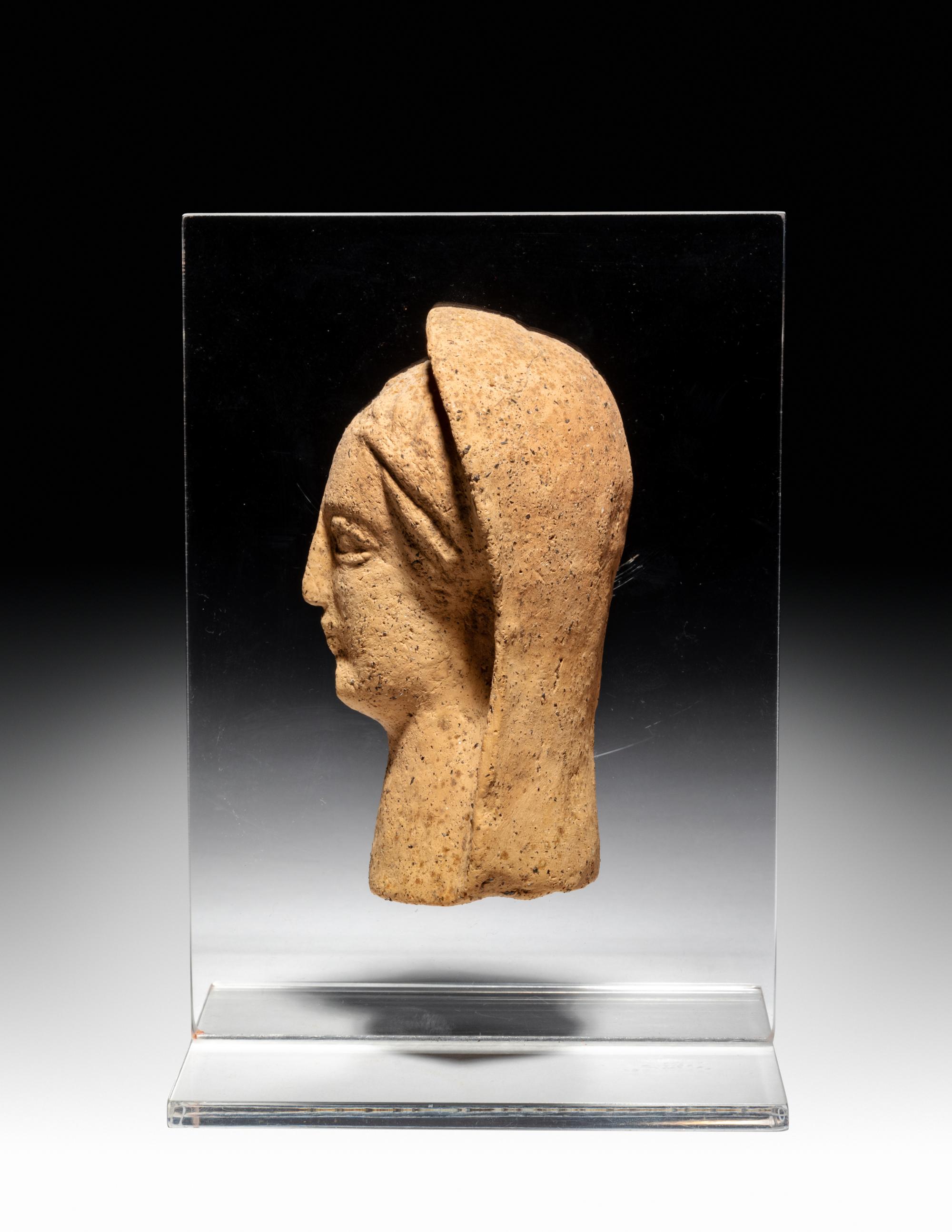 An Etruscan Terra Cotta Votive Half Head