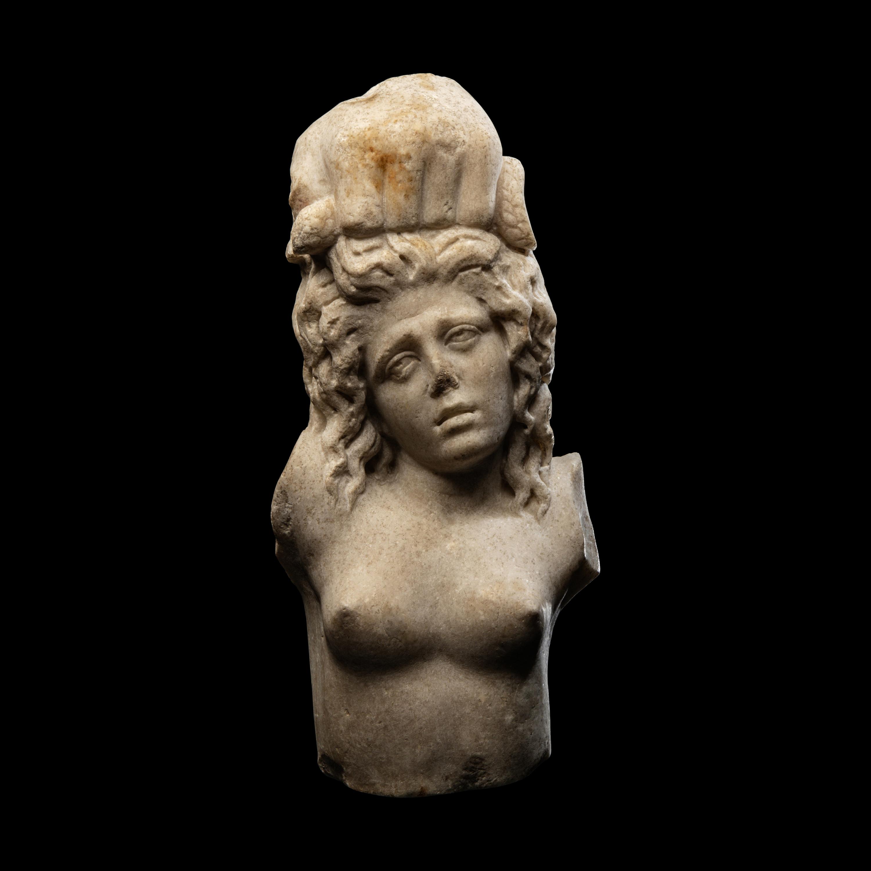 A Roman Marble Fragment with a Female Figure