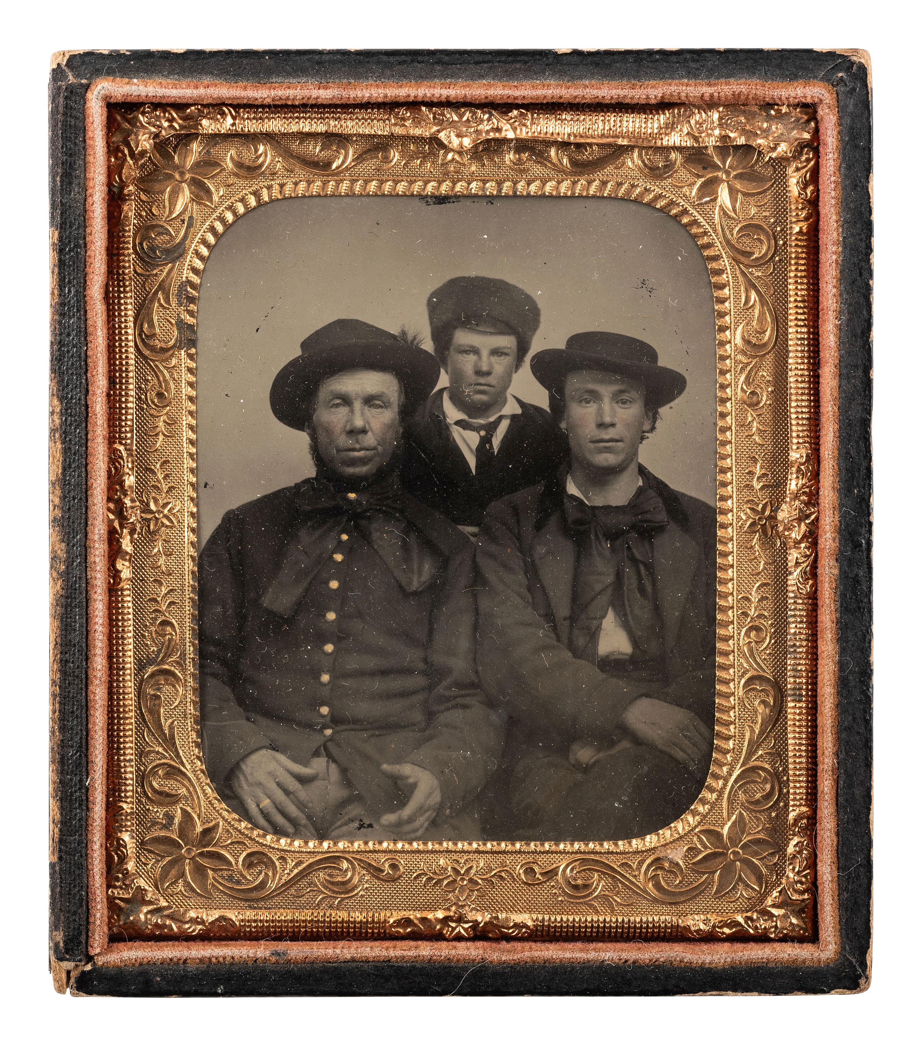 [CIVIL WAR] Sixth plate tintype of three men of varying ages, with a possible Pennsylvania Bucktail.