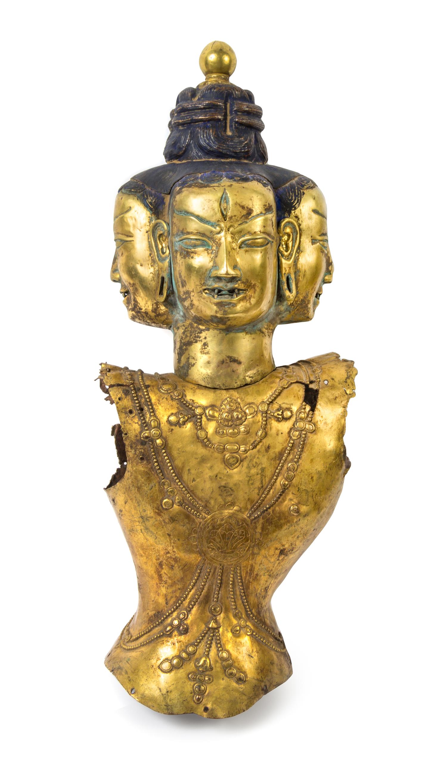 A Tibetan Gilt Bronze Bust 17TH/18TH CENTURY Overall height 25 inches. — 17TH/18TH CENTURY