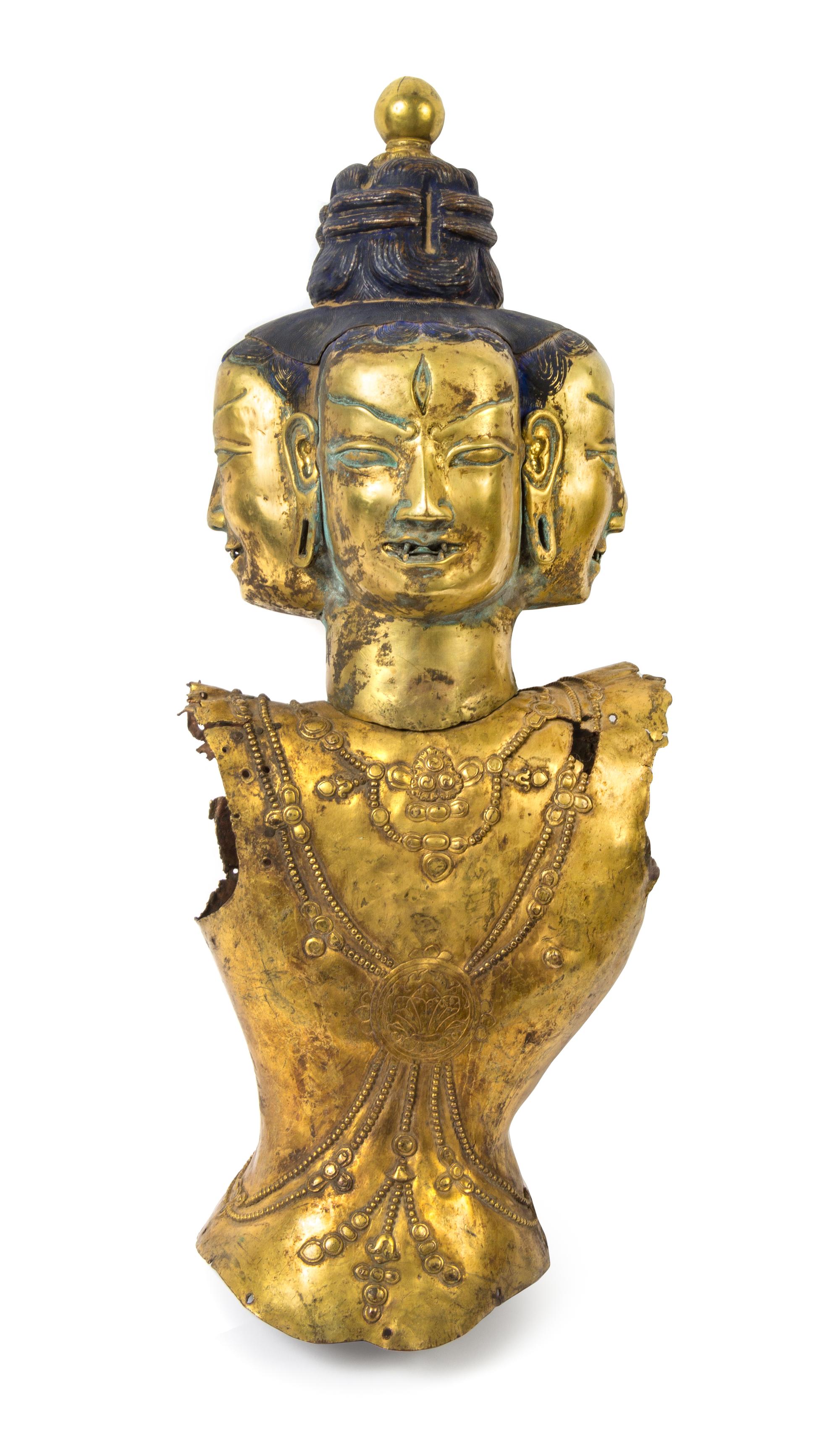 A Tibetan Gilt Bronze Bust 17TH/18TH CENTURY Overall height 25 inches. — 17TH/18TH CENTURY