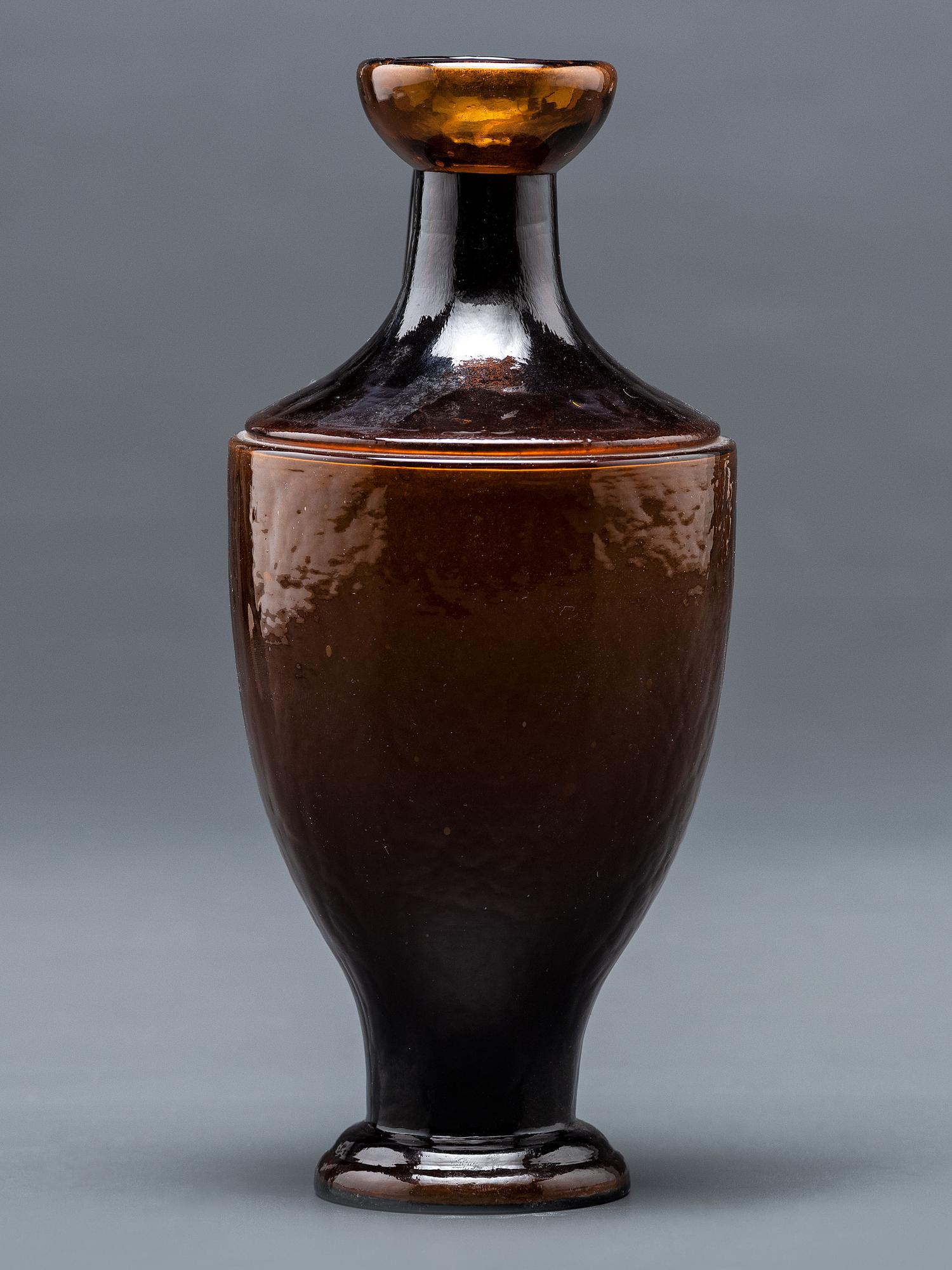 A New York Mold-Blown Amber Bottle