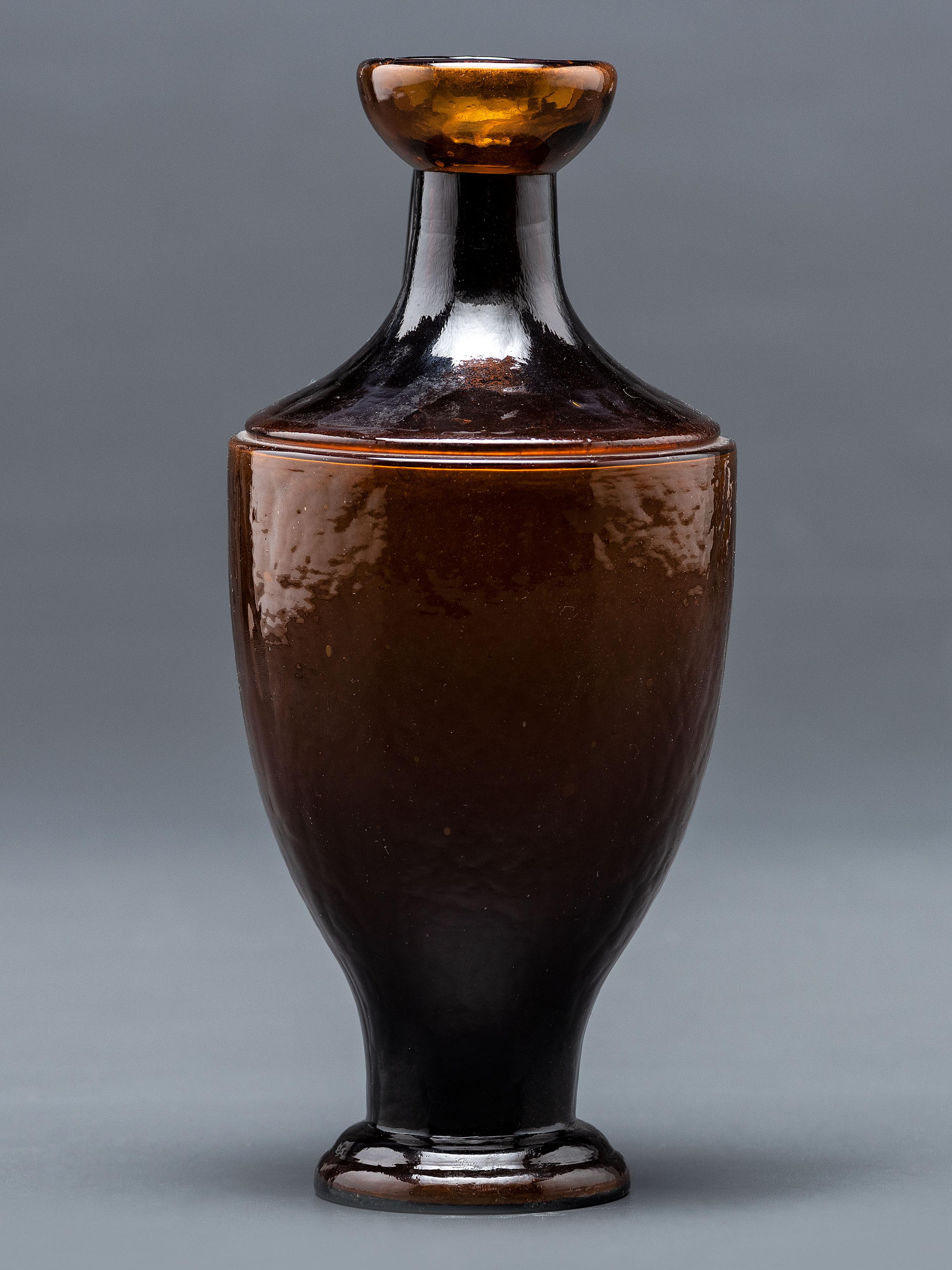 A New York Mold-Blown Amber Bottle