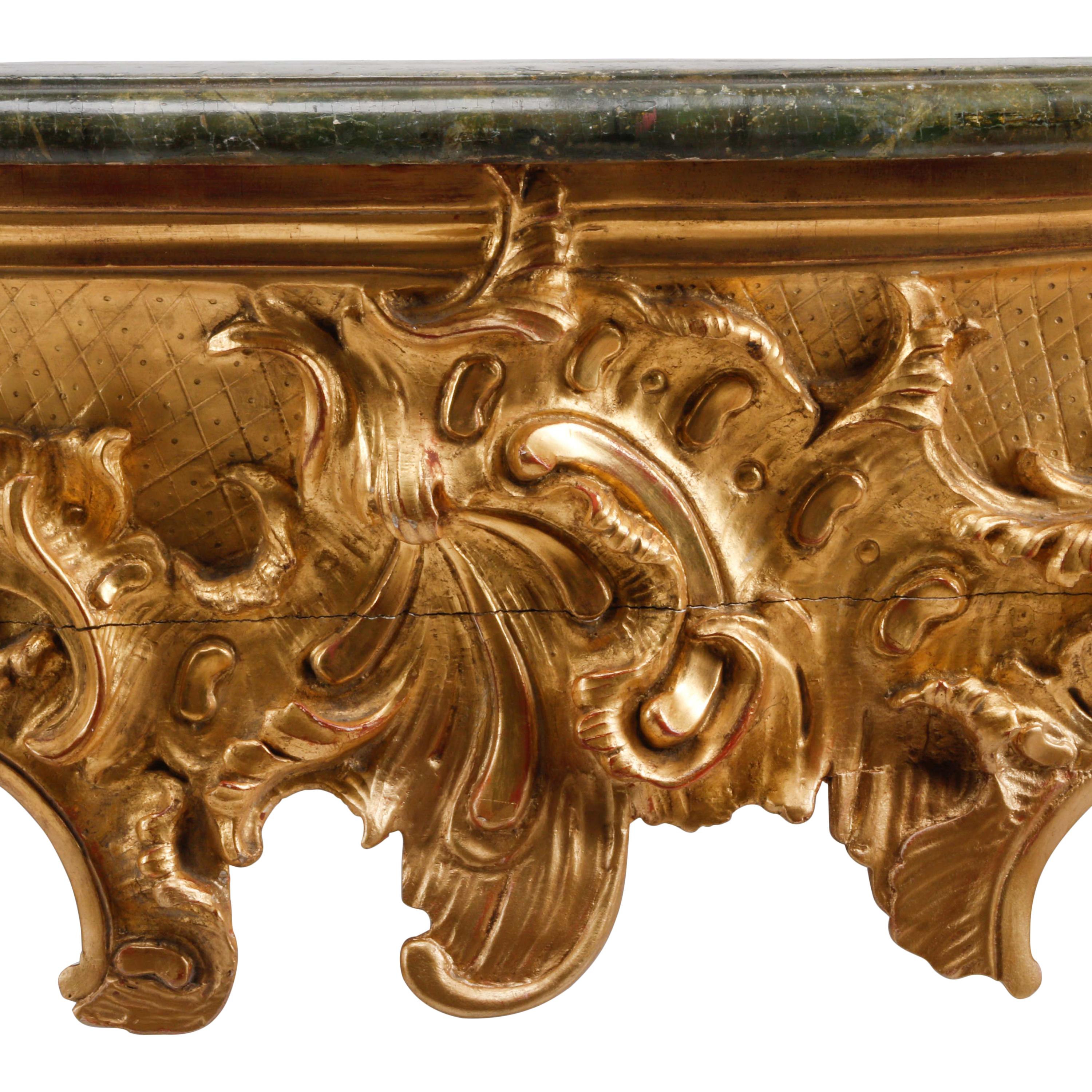 A Pair of German Rococo Style Giltwood Console Tables