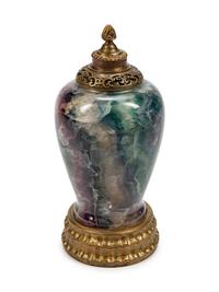 A Chinese Gilt-Bronze-Mounted Carved Flourite Urn