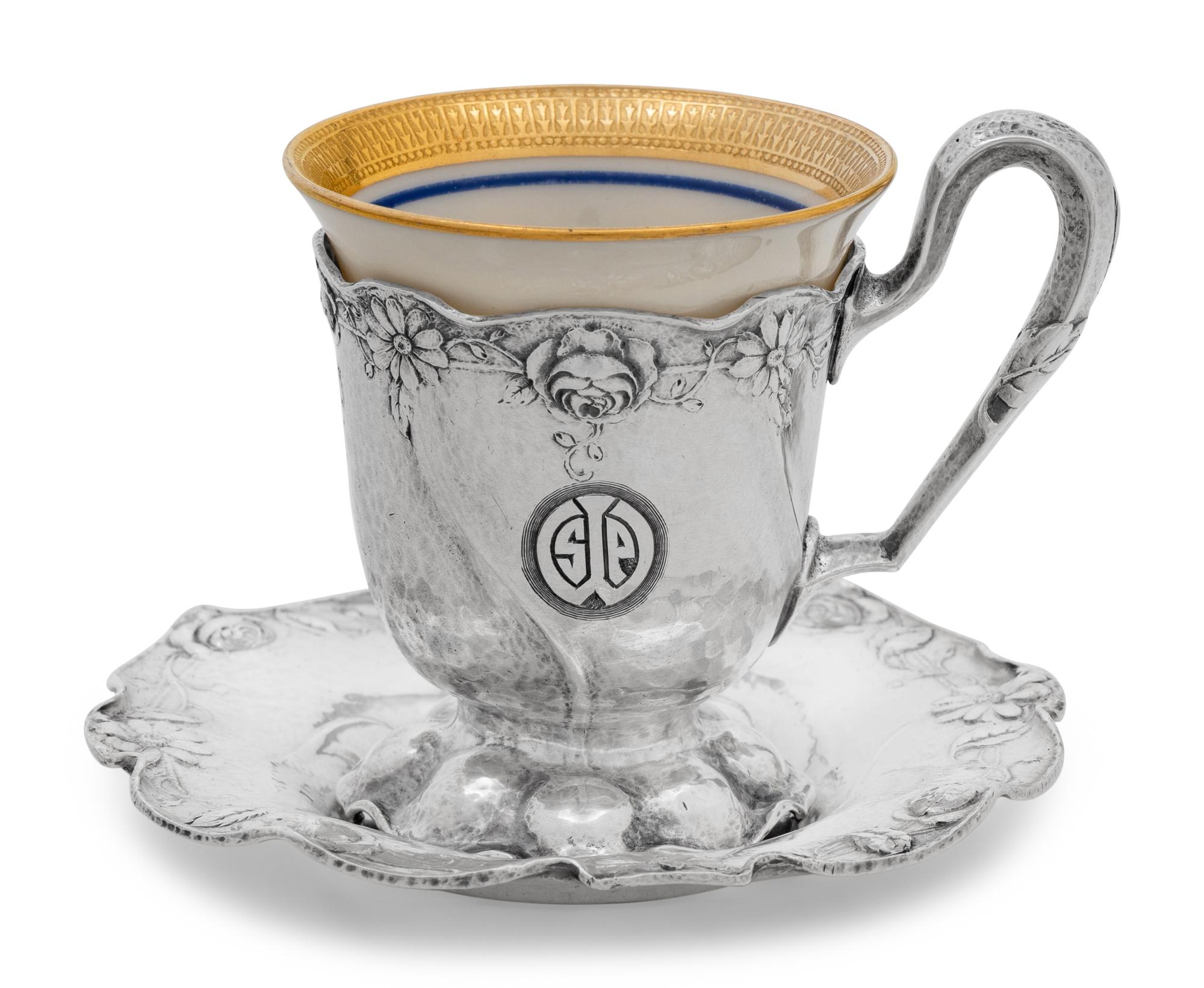 A Set of Twelve American Silver Martelé Coffee Cups and Saucers