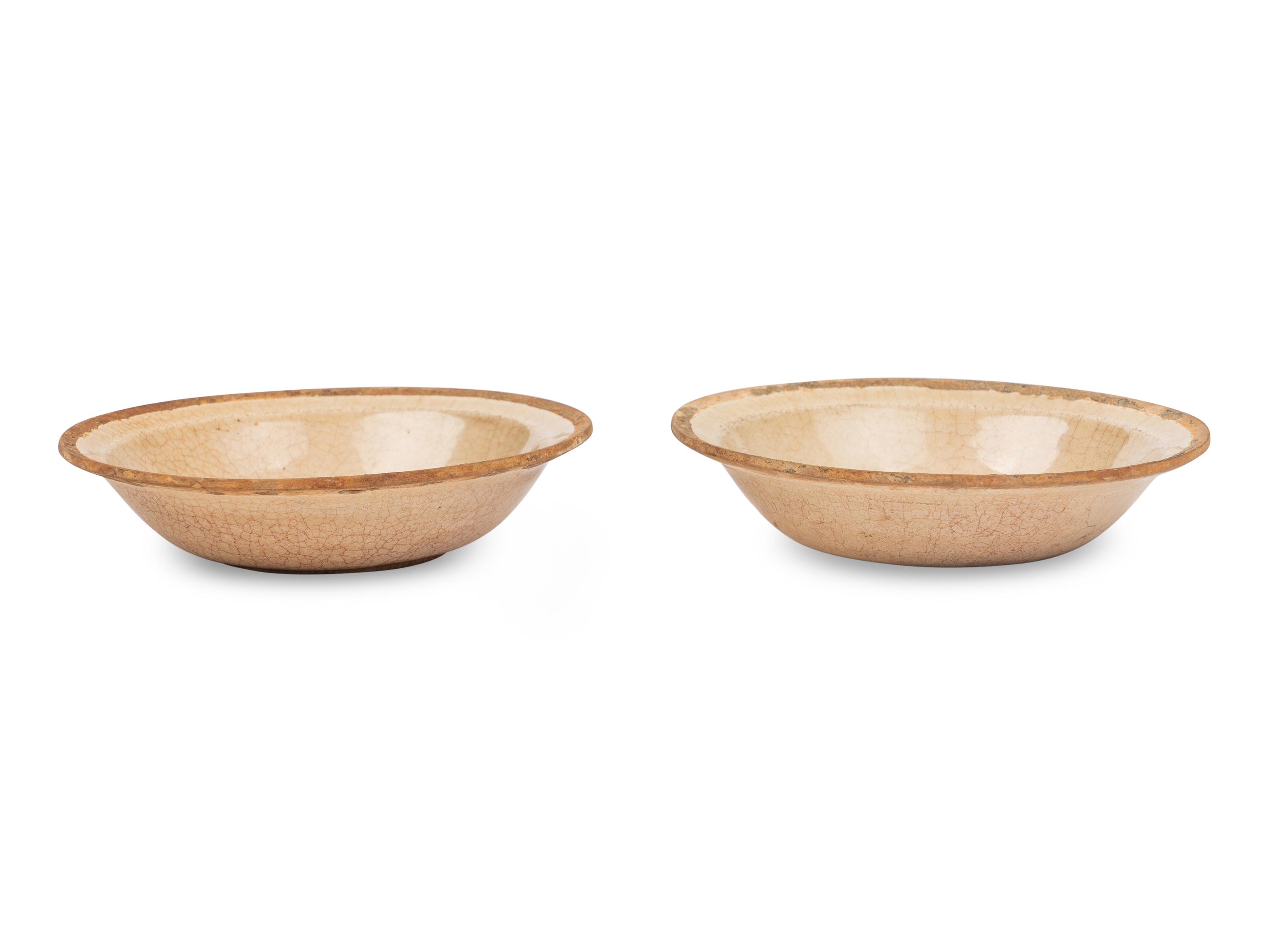 A Pair of Chinese White Ground Crackle Glazed Stoneware Bowls
