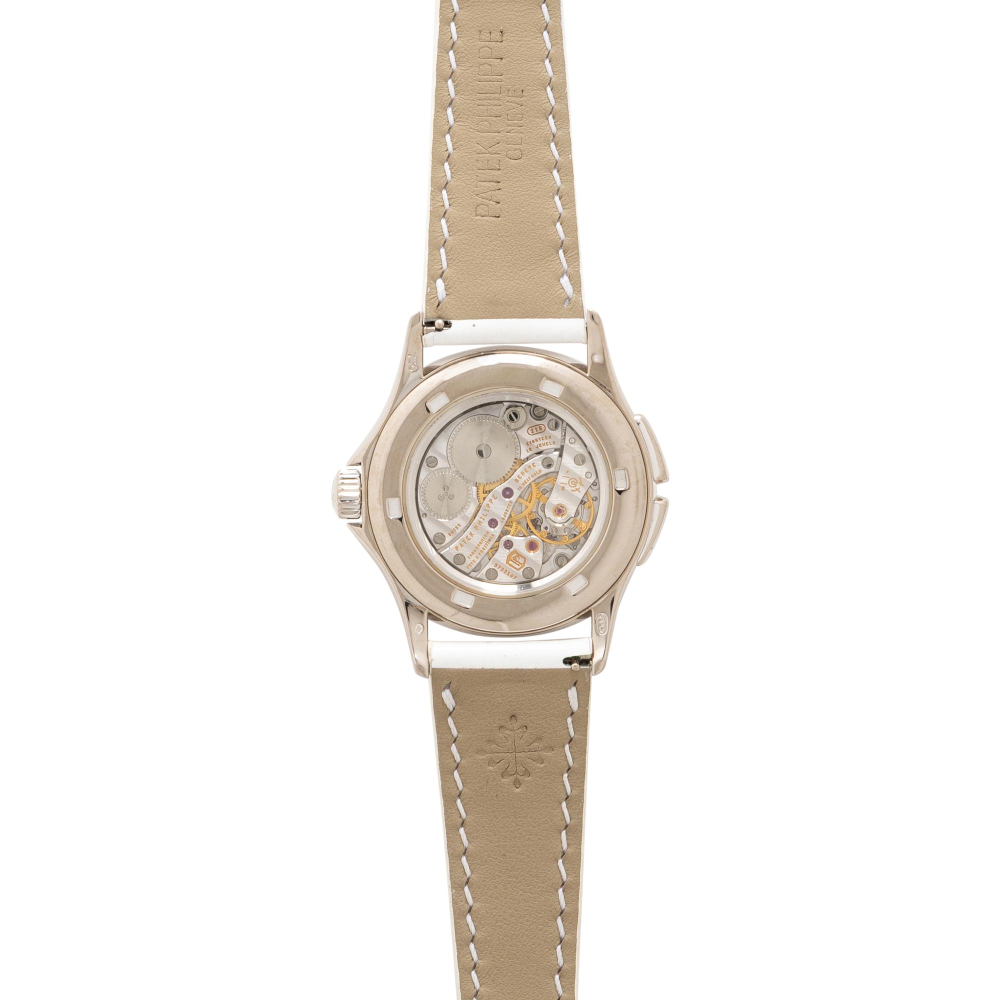 PATEK PHILIPPE, REF. 4934G 18K WHITE GOLD, MOTHER-OF-PEARL AND DIAMOND 'CALATRAVA' 'TRAVEL TIME' WATCH, WITH PATEK EXTRACT