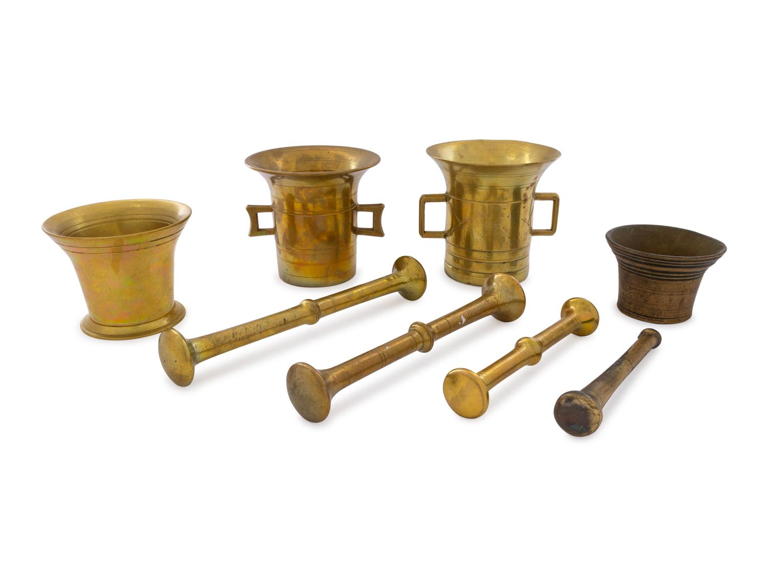 A Group of Four Brass Mortar-and-Pestles