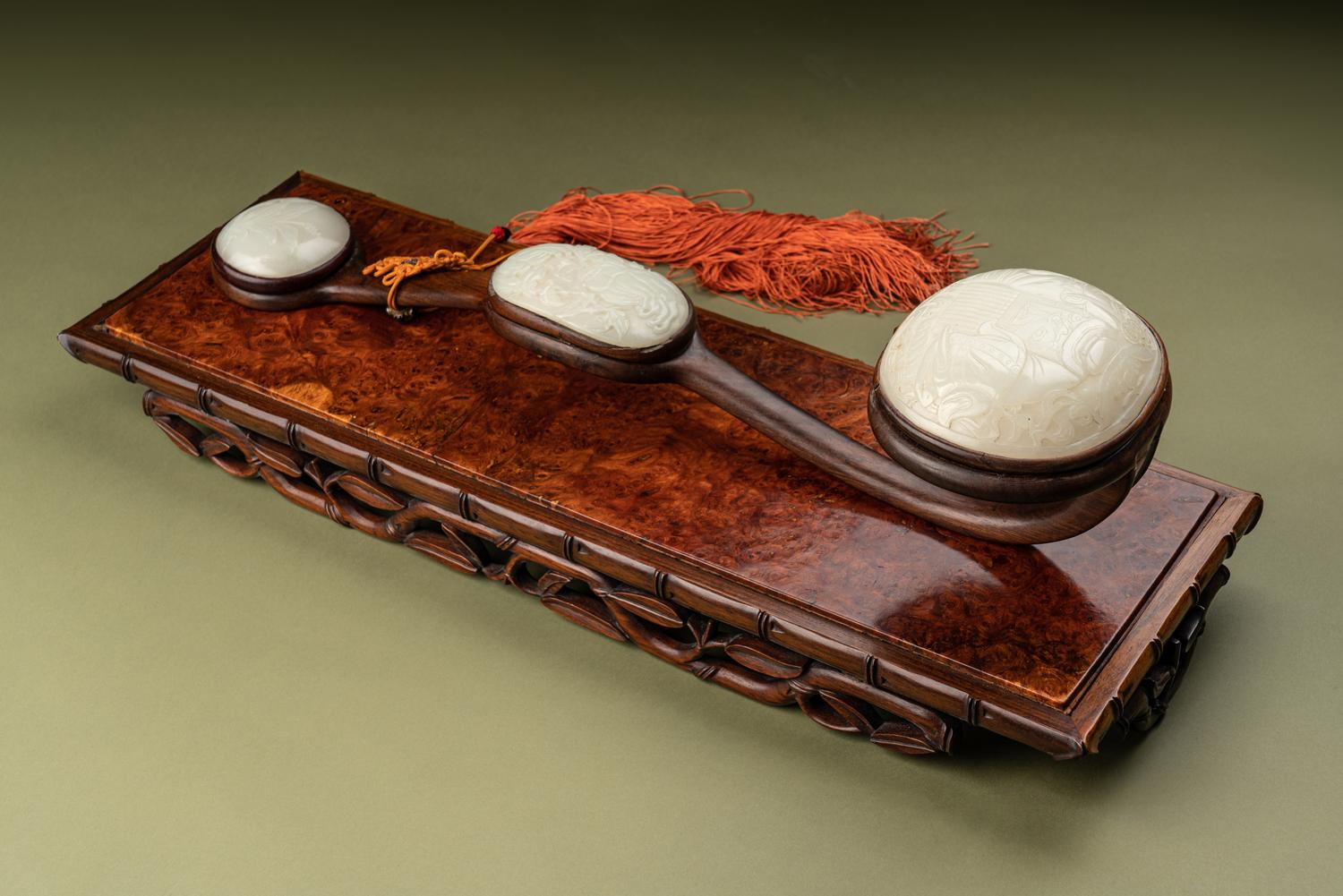 A Large White Jade Inset Hardwood Ruyi Scepter