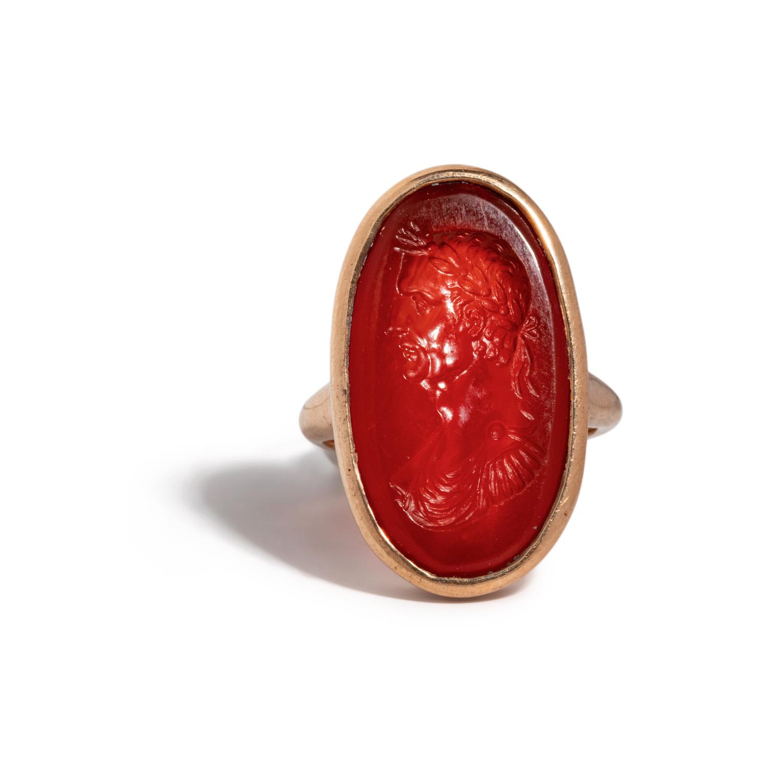 A Neoclassical Carnelian and Gold Finger Ring with a Portrait Bust of the Roman Emperor Augustus
