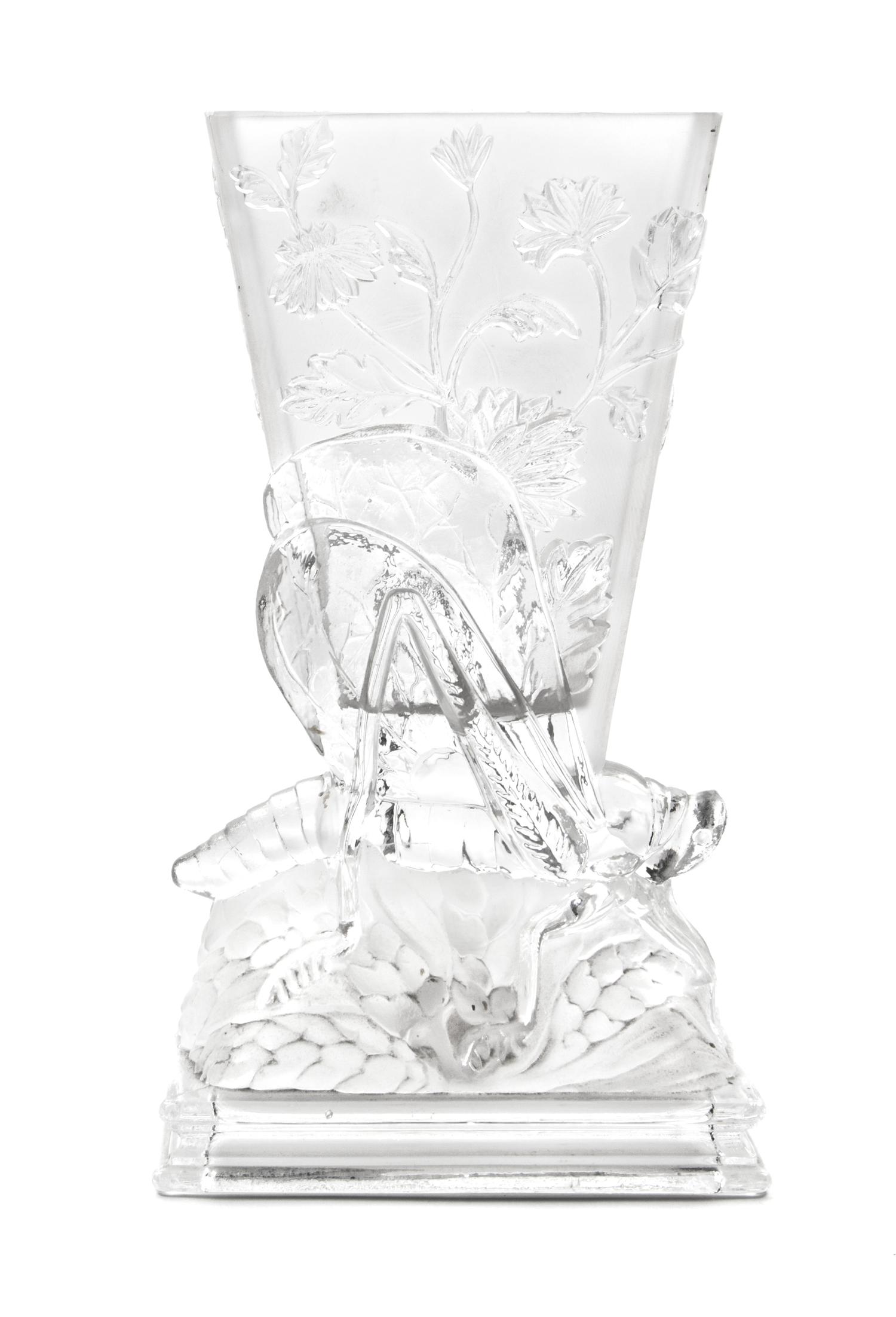 A Baccarat Frosted and Molded Glass Vase Height 8 1/4 inches. — CIRCA 1925
