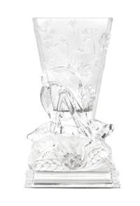 A Baccarat Frosted and Molded Glass Vase Height 8 1/4 inches. — CIRCA 1925