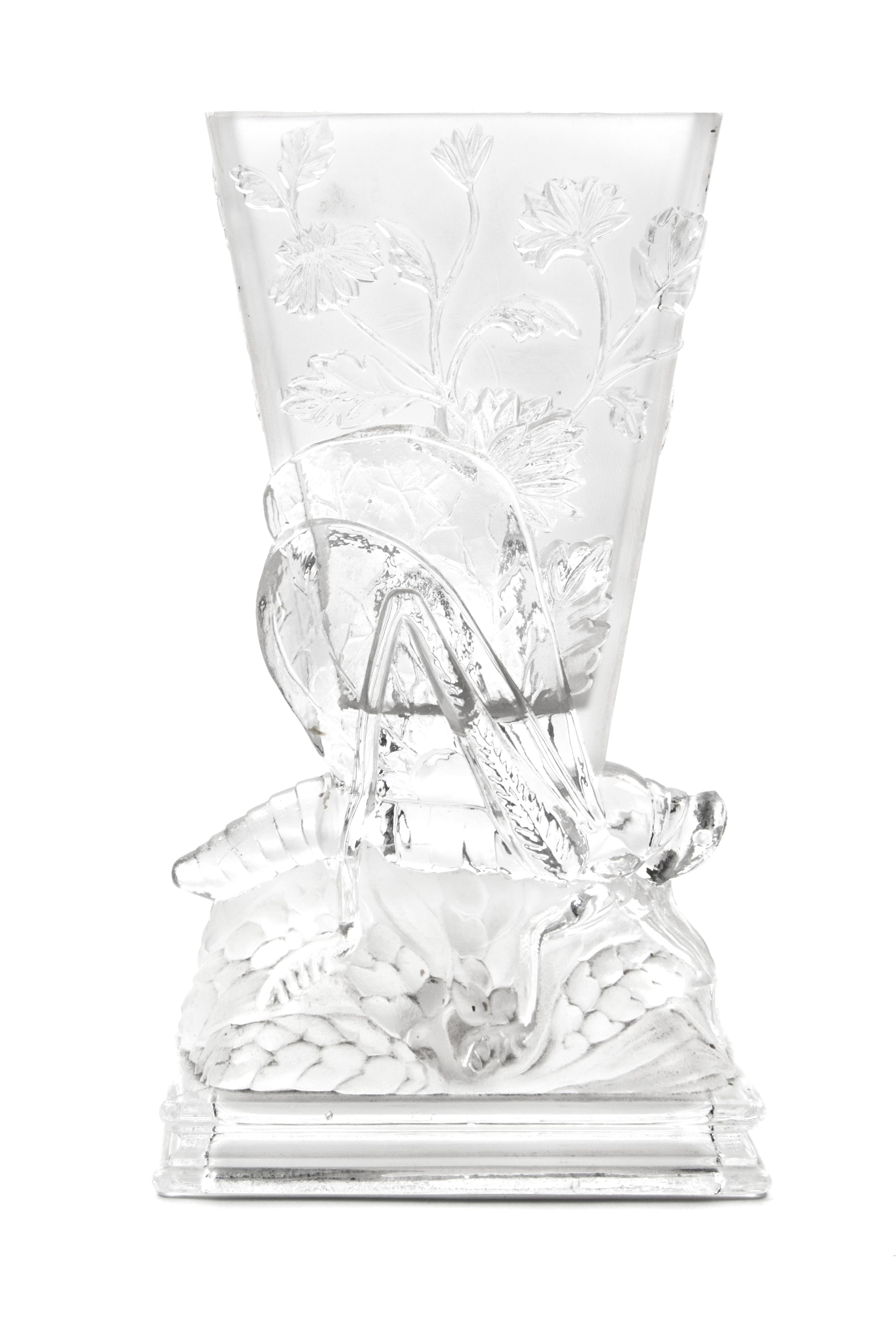 A Baccarat Frosted and Molded Glass Vase Height 8 1/4 inches. — CIRCA 1925