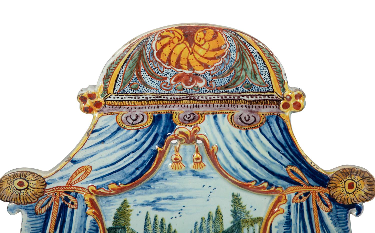 A Pair of Continental Polychrome Faience Wall Plaques