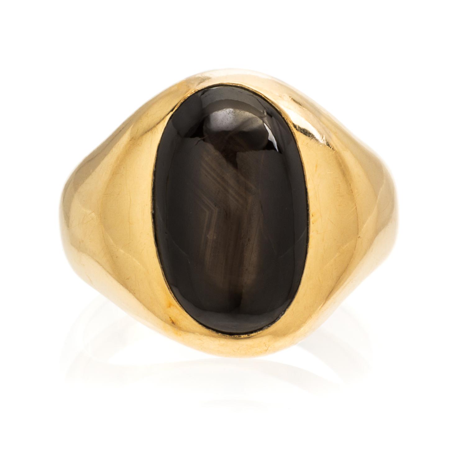 A 14 Karat Yellow Gold and Black Star Sapphire Ring, Larter & Sons, 8.50 dwts.