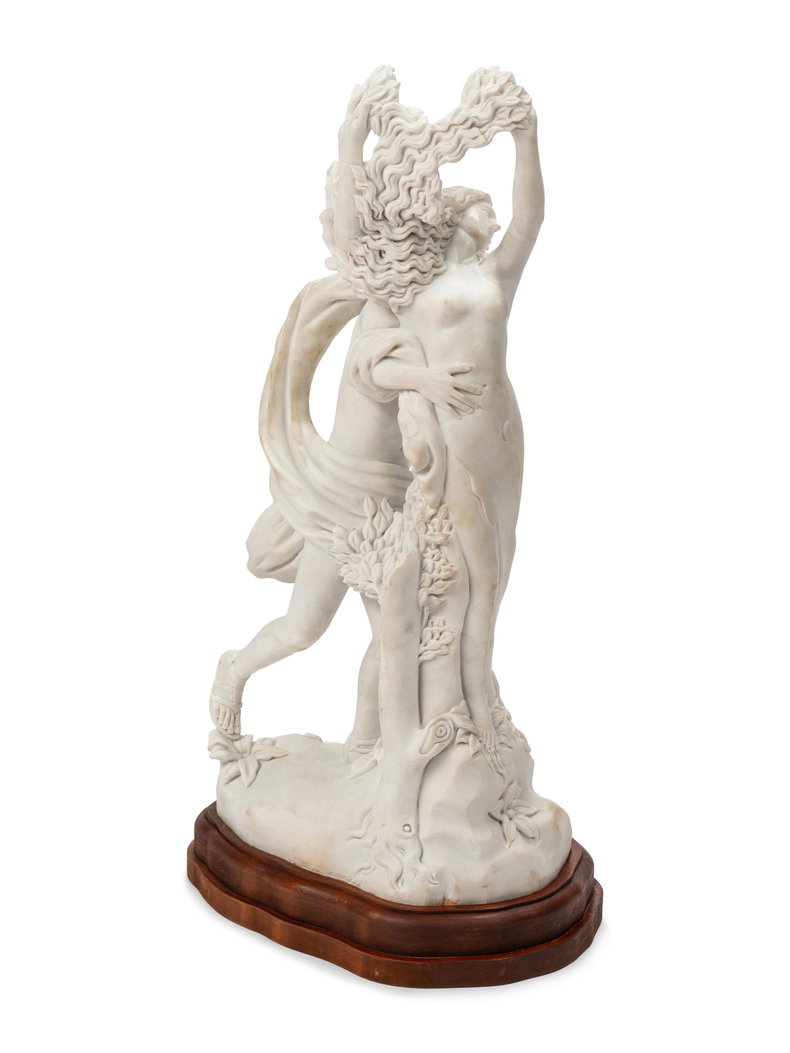 A Continental Marble Figural Group on a Wood Base