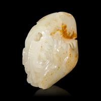 A Chinese White and Russet Jade 'Lotus' Pendant, 18th/19th Century — 清中期 白玉帶皮鏤雕蓮塘荷葉佩