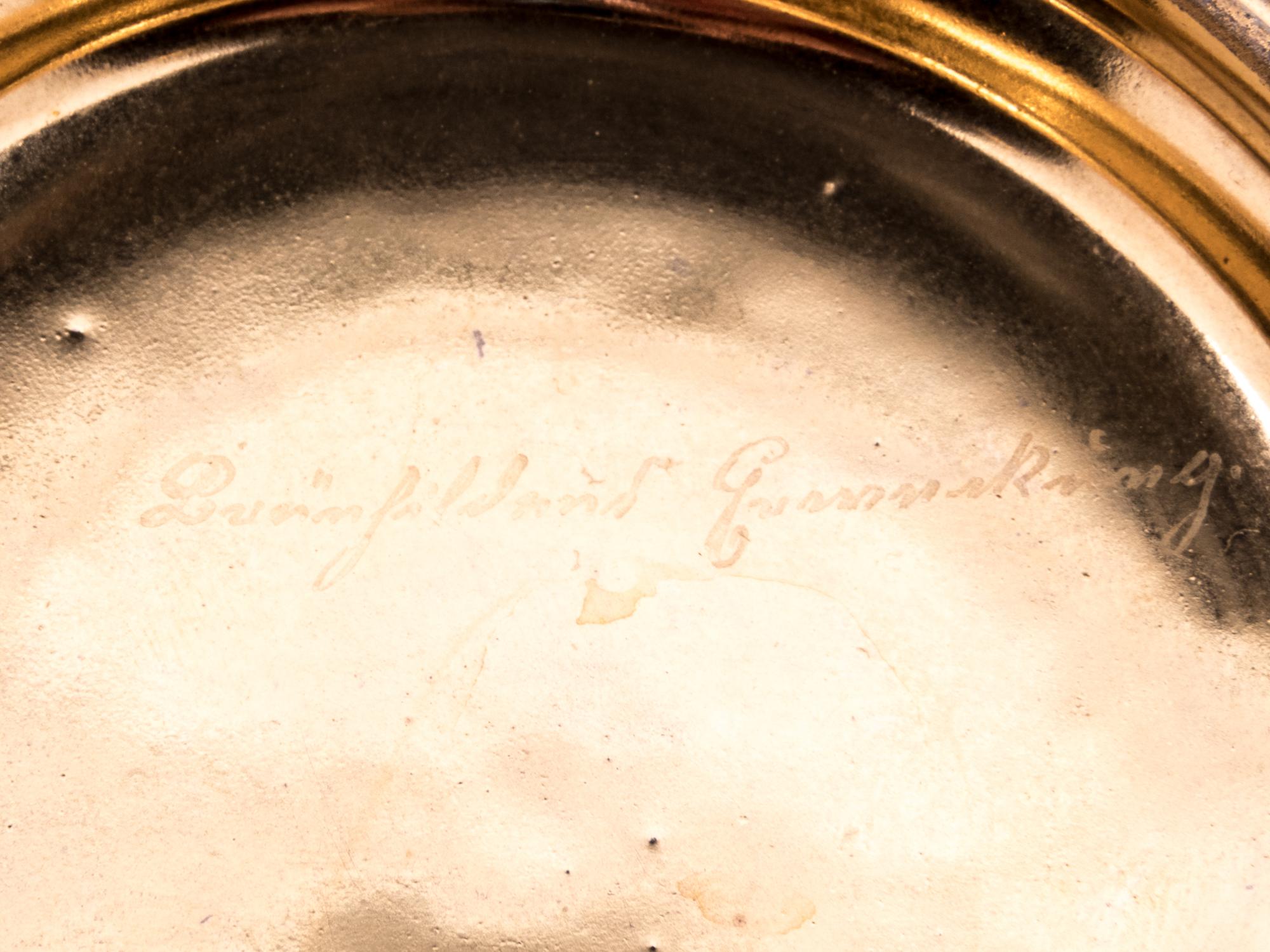 A Vienna Painted and Parcel Gilt Porcelain Covered Box