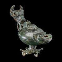 A Late Roman Bronze Lamp with Bull Head Handle and Greek Inscription