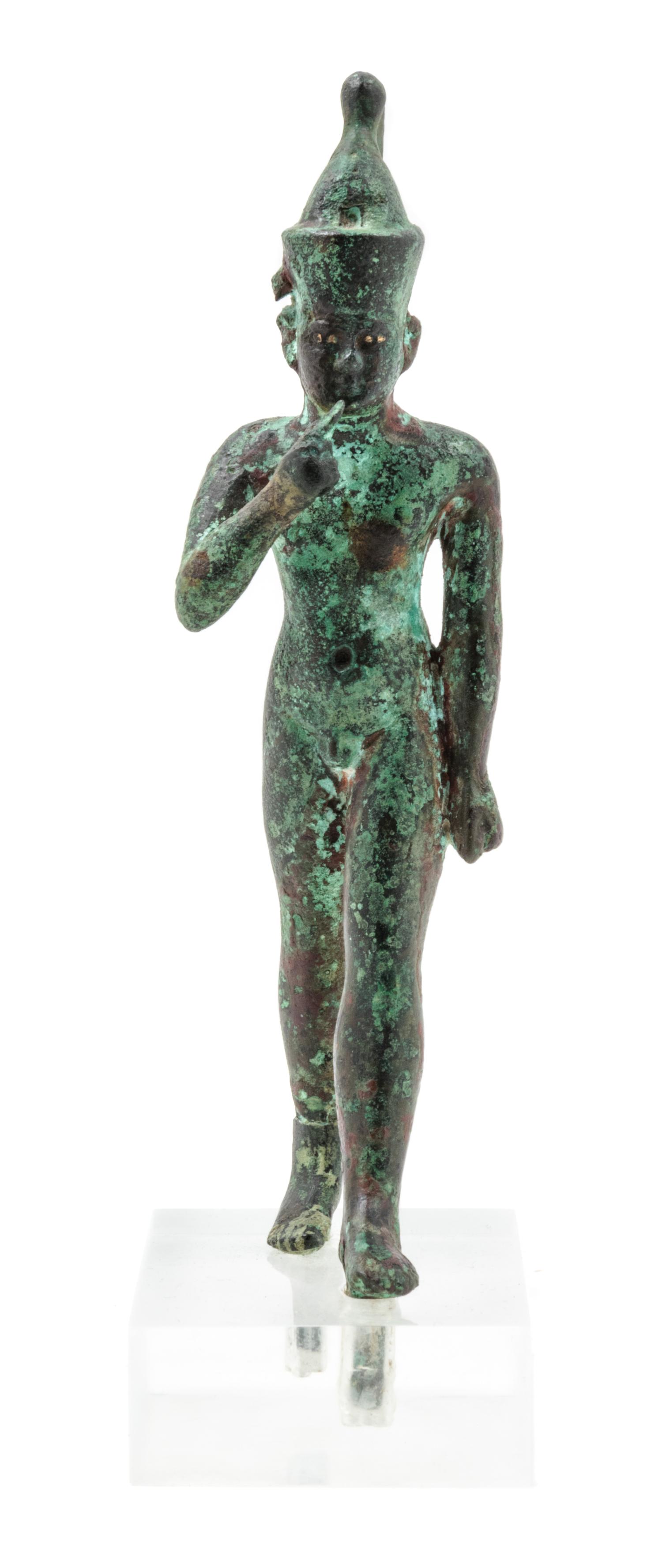 An Egyptian Bronze Harpokrates — LATE PERIOD TO PTOLEMAIC PERIOD, 664-30 B.C.E.