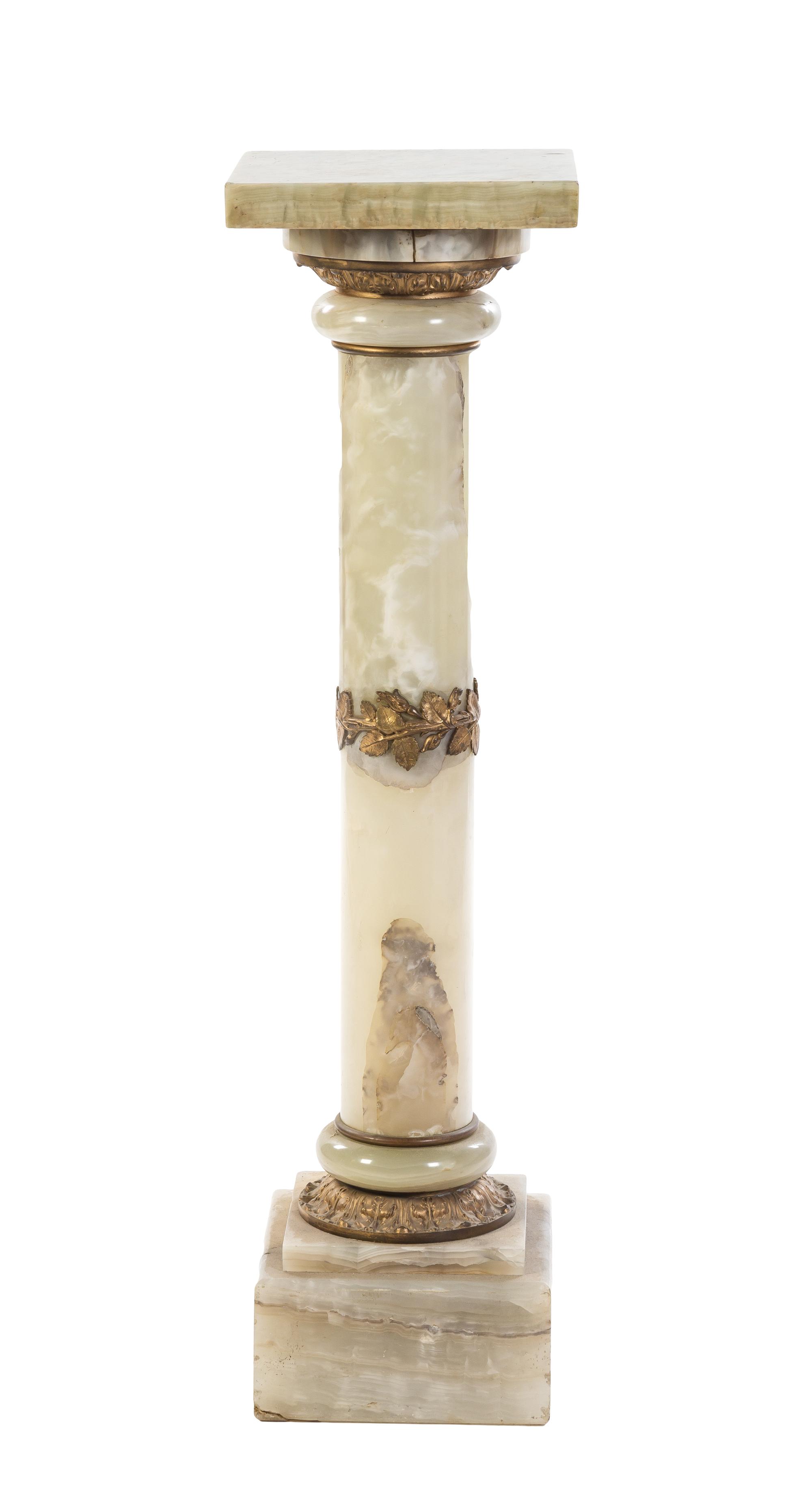 A Continental Gilt Bronze Mounted Onyx Pedestal, Height 41 1/2 inches.