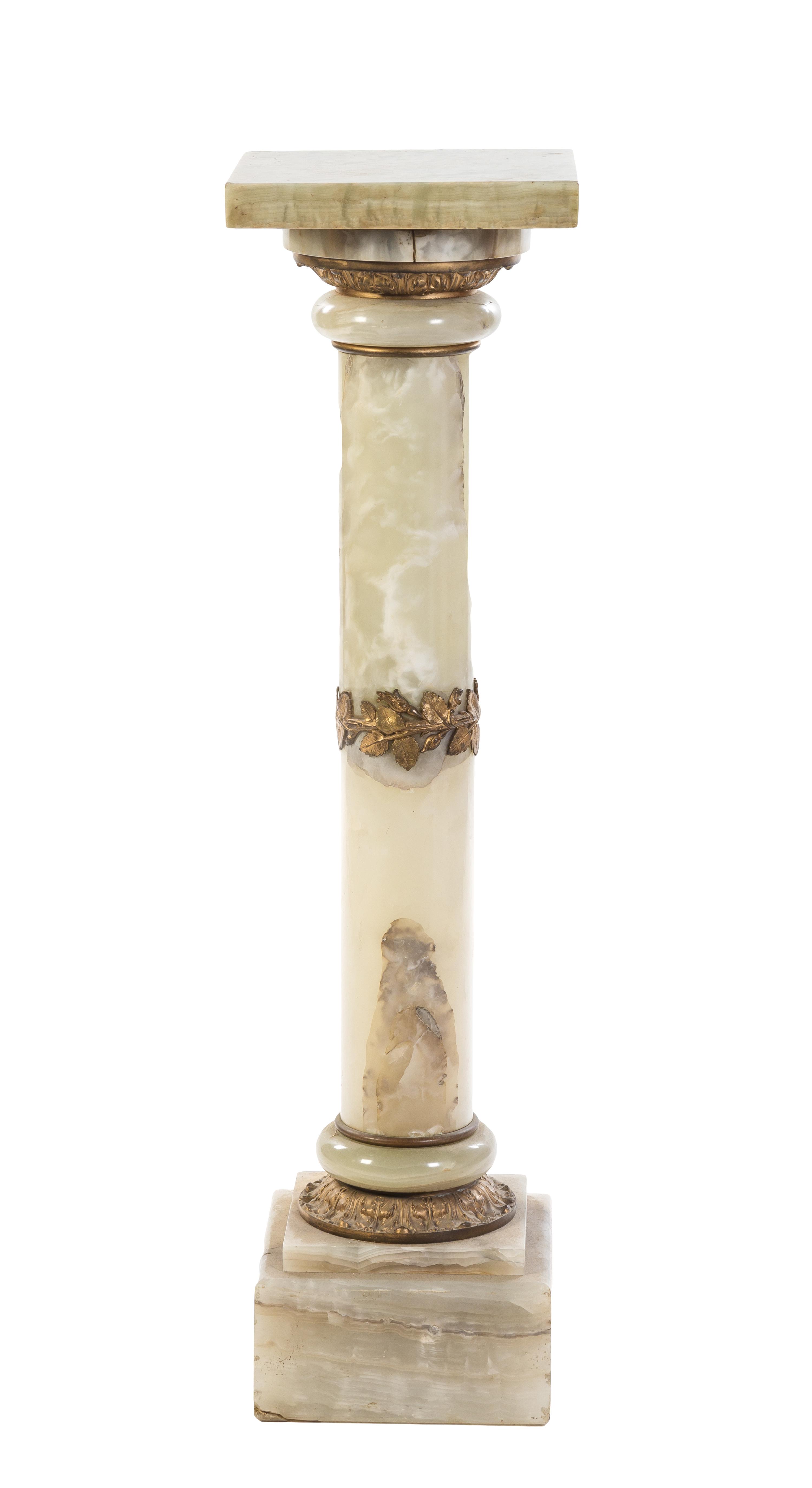 A Continental Gilt Bronze Mounted Onyx Pedestal, Height 41 1/2 inches.